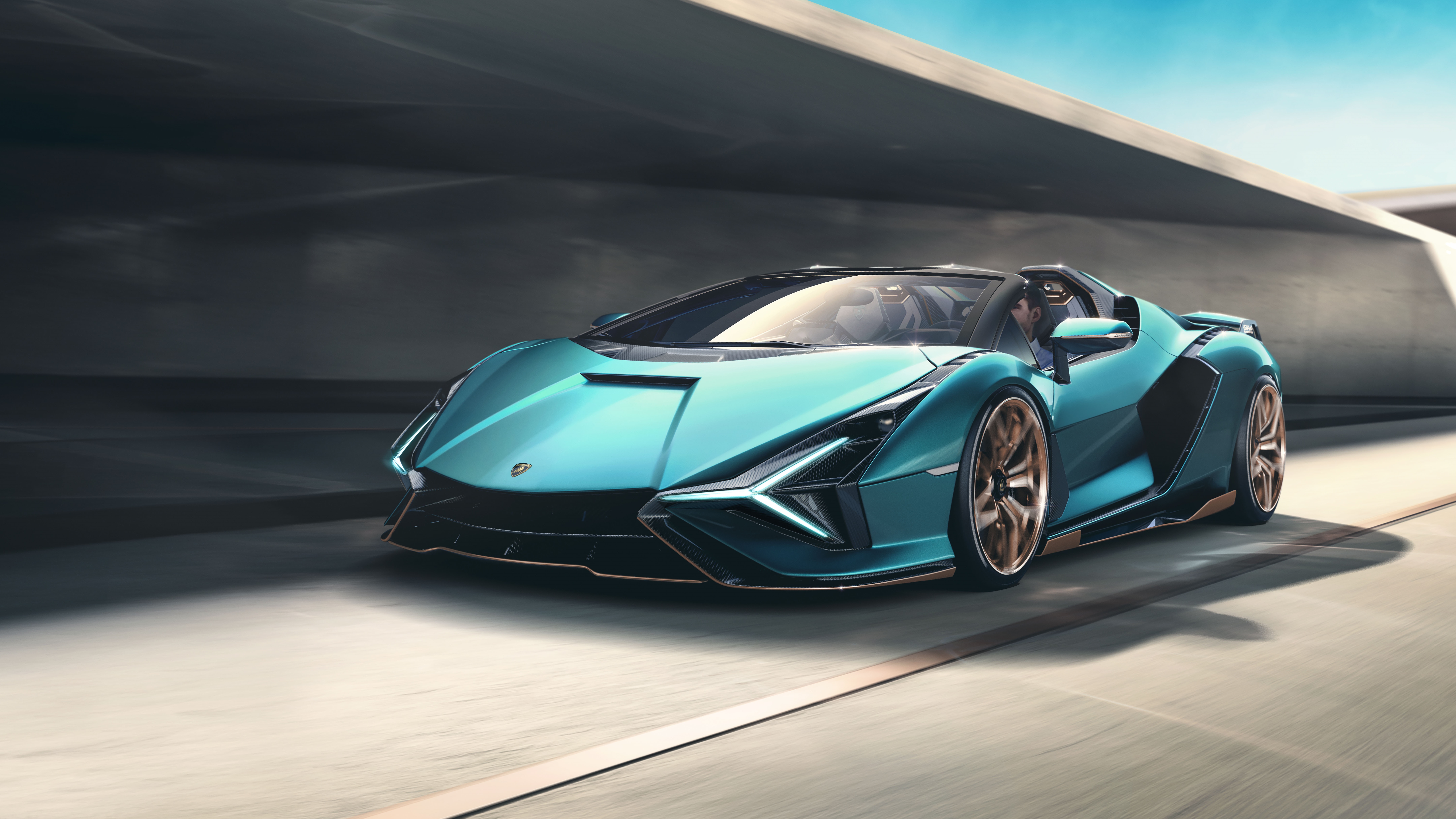Lamborghini Sian Roadster driving on a road HD Wallpaper