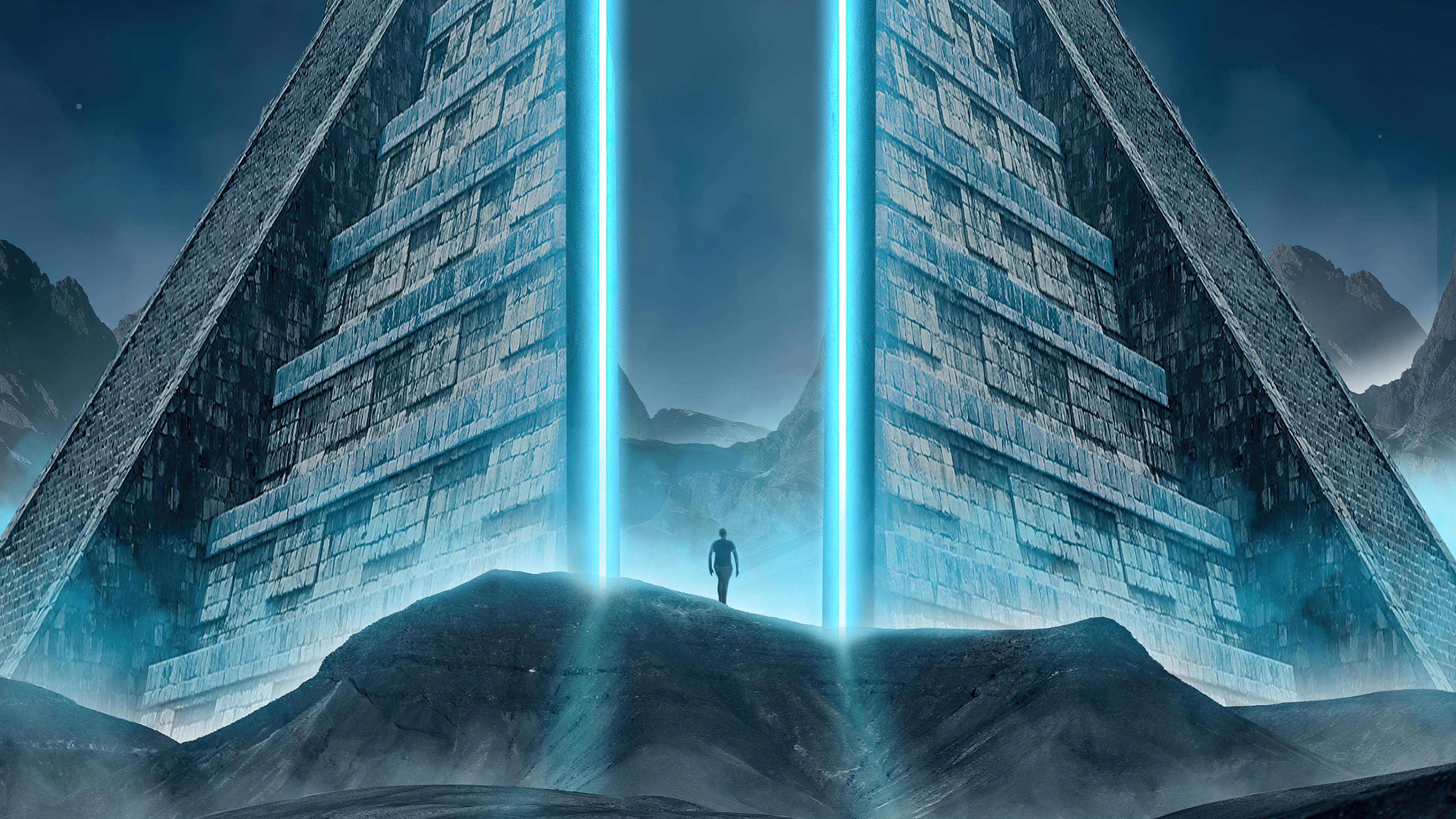 Man standing before a massive alien pyramid with blue energy beams HD Wallpaper