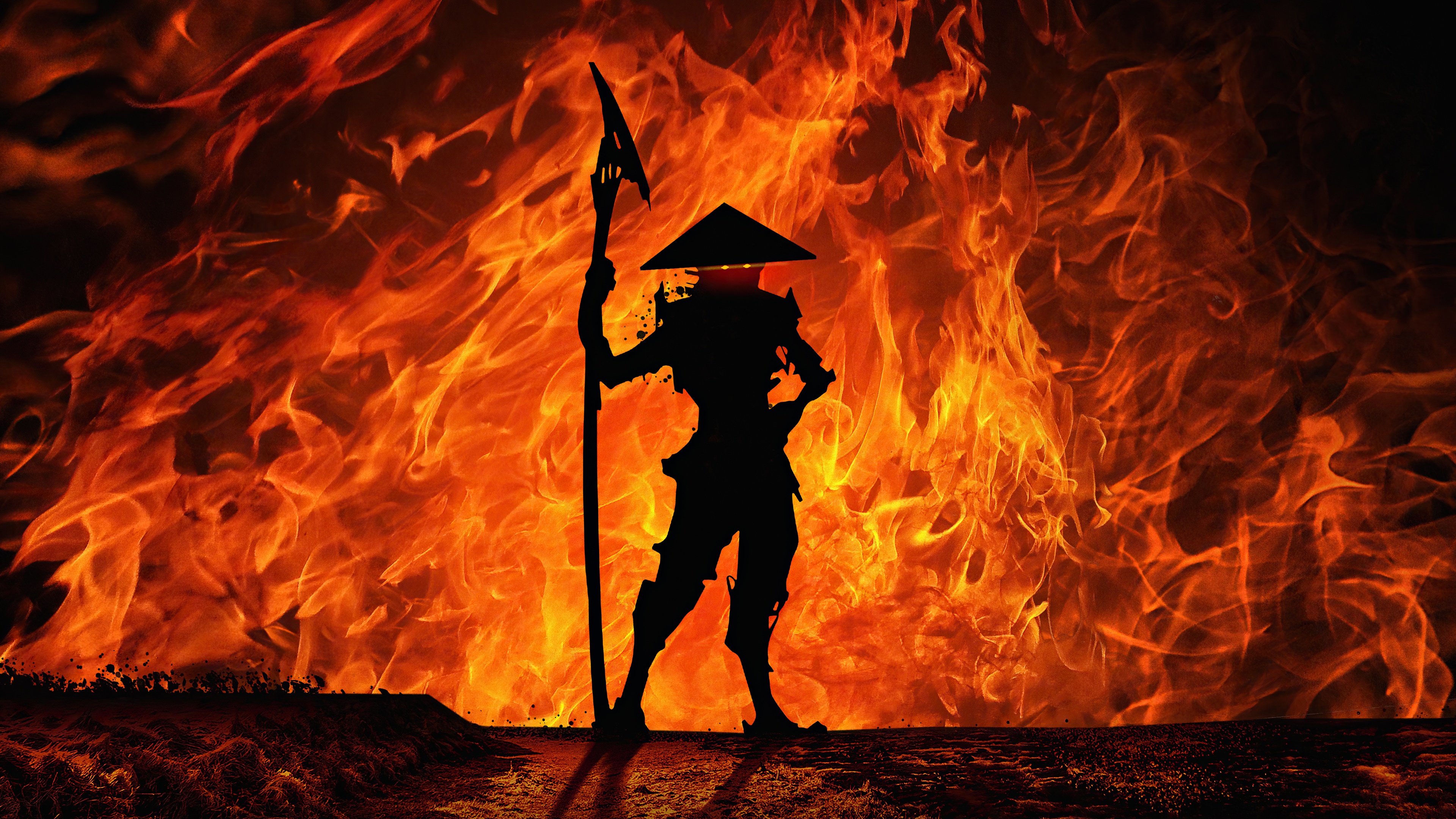 Silhouette of a warrior with a spear against a fiery background HD Wallpaper