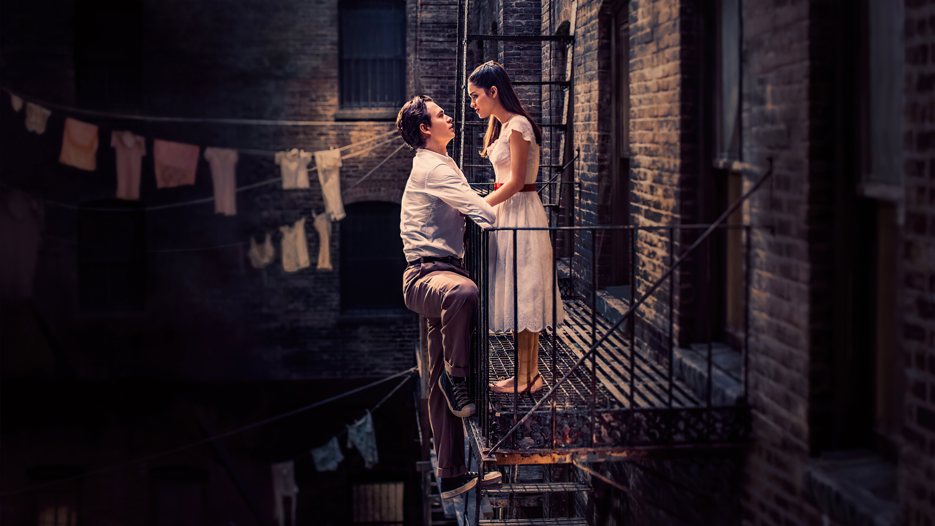 Couple on a fire escape HD Wallpaper
