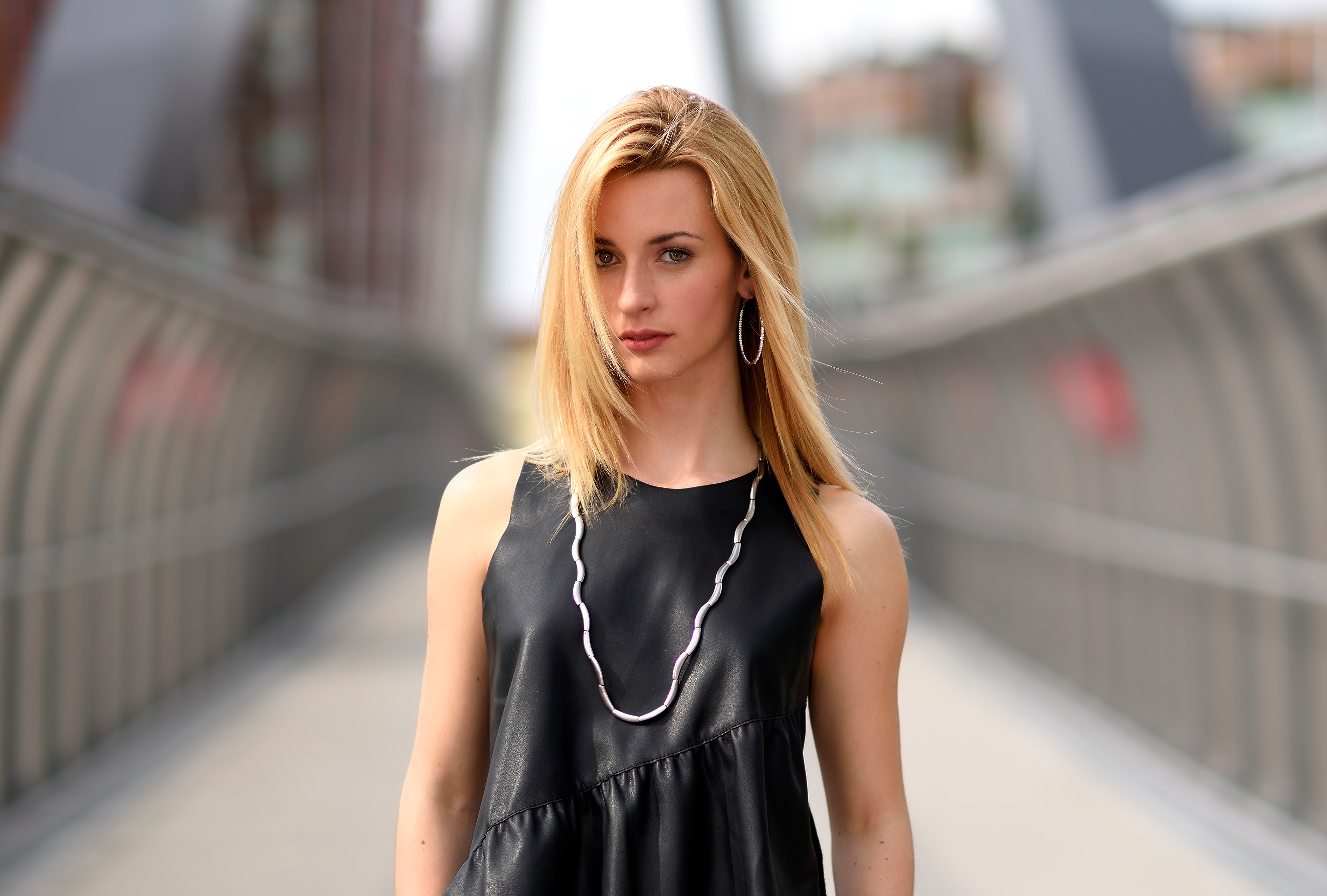Blonde woman in black dress on a bridge HD Wallpaper