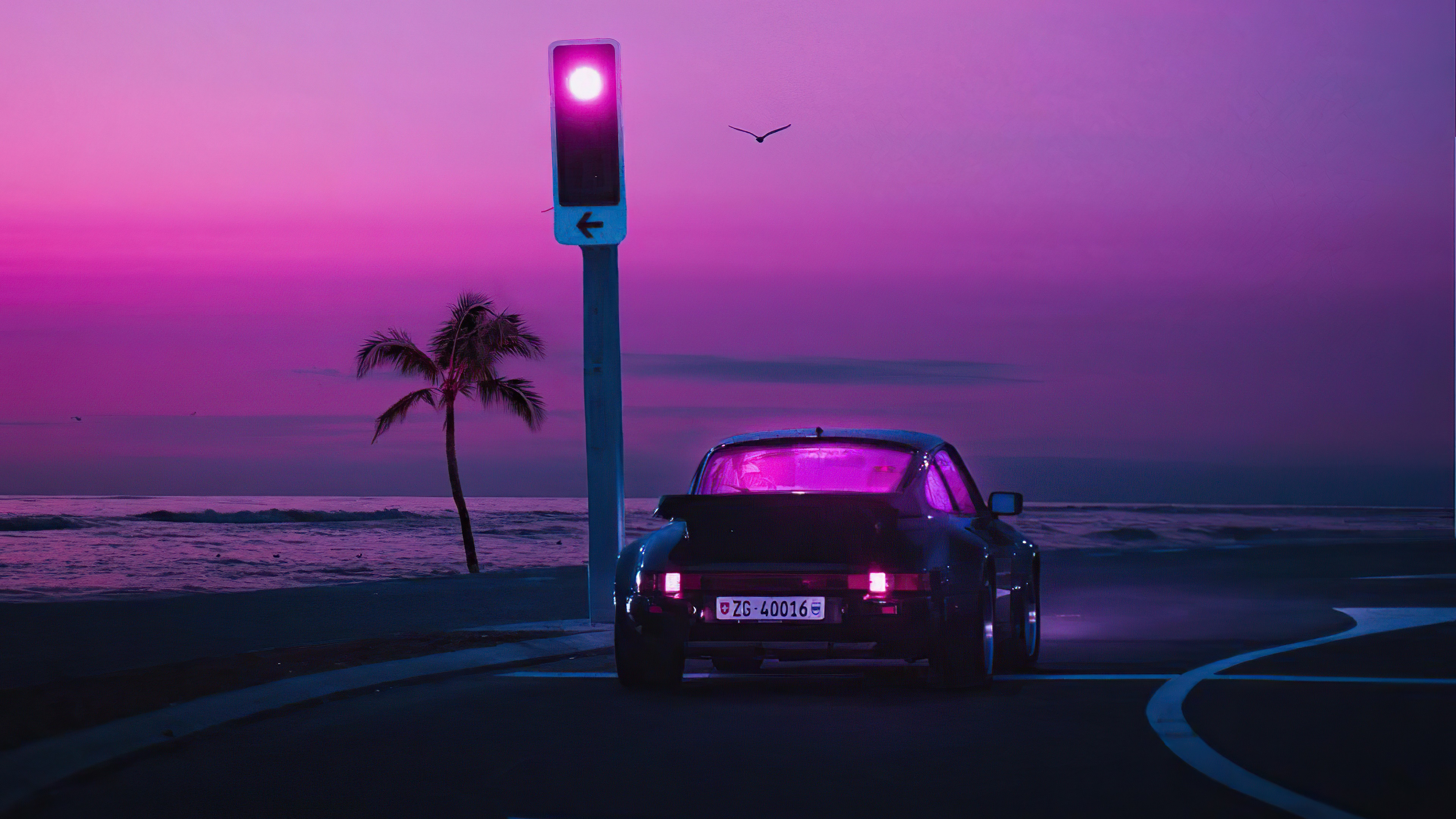 Porsche 911 on a coastal road at sunset HD Wallpaper
