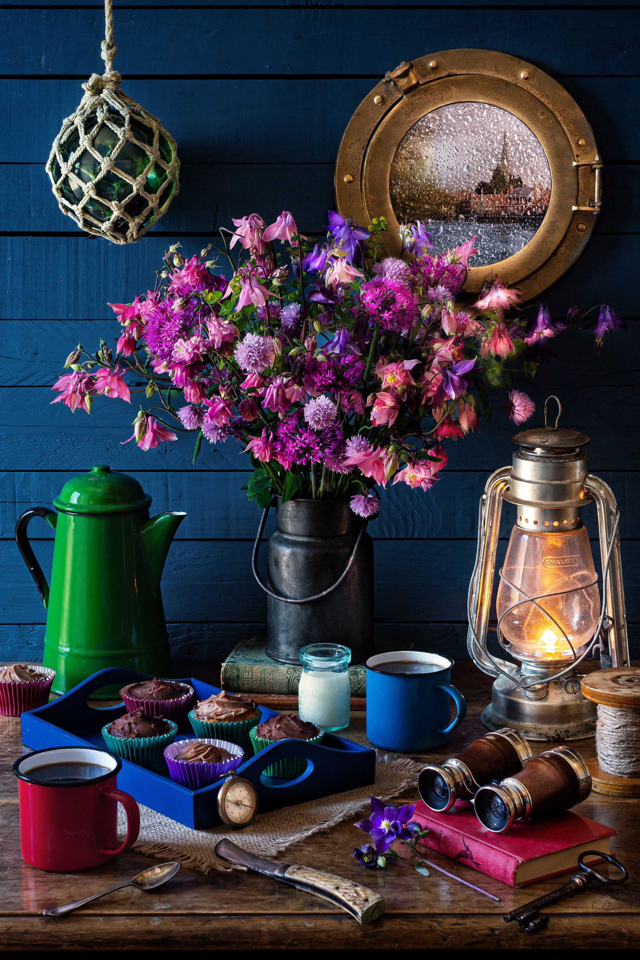 Still life with flowers, cupcakes, and kerosene lamp HD Phone Wallpaper