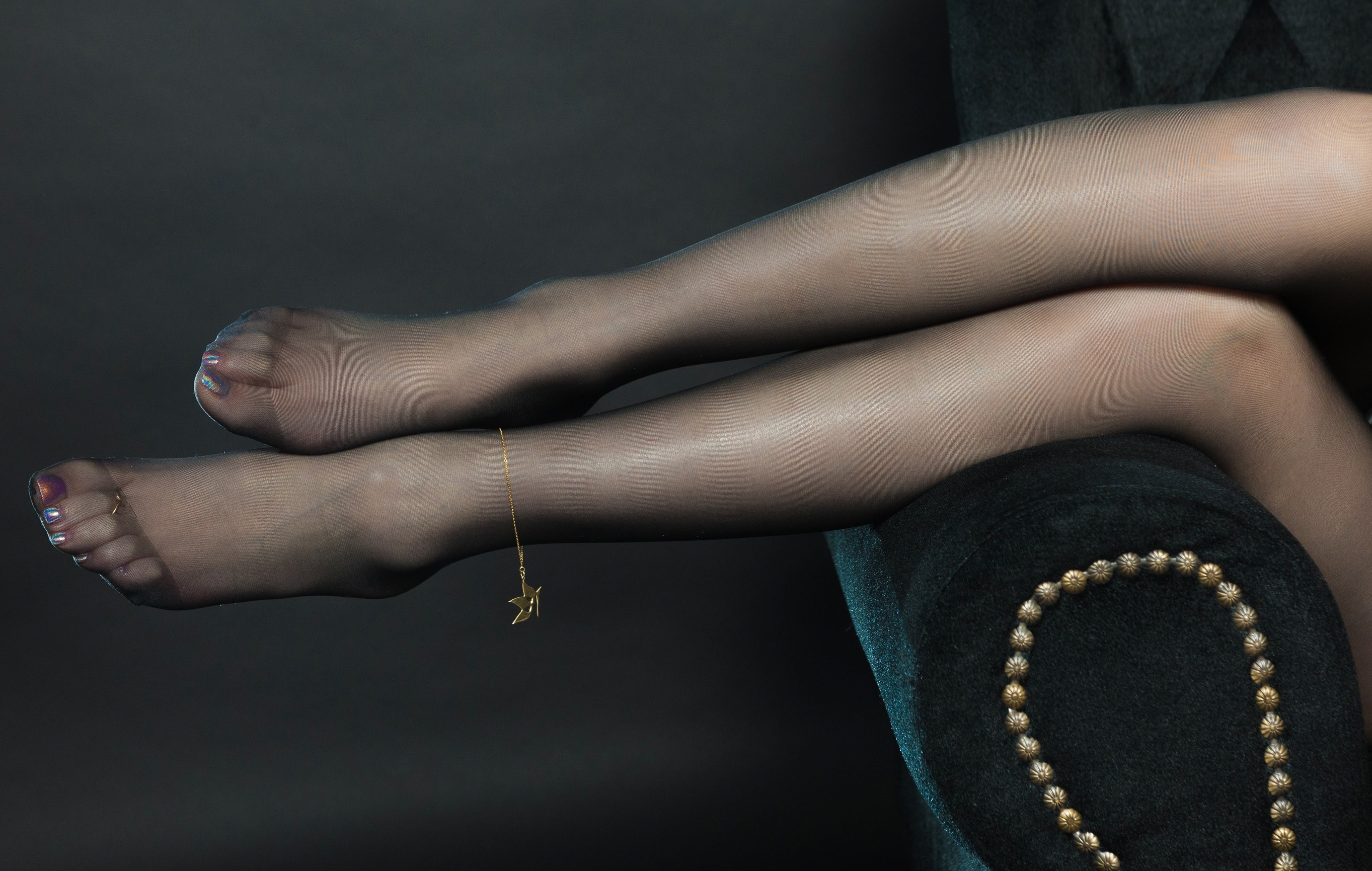 Woman's legs in pantyhose with anklet HD Wallpaper