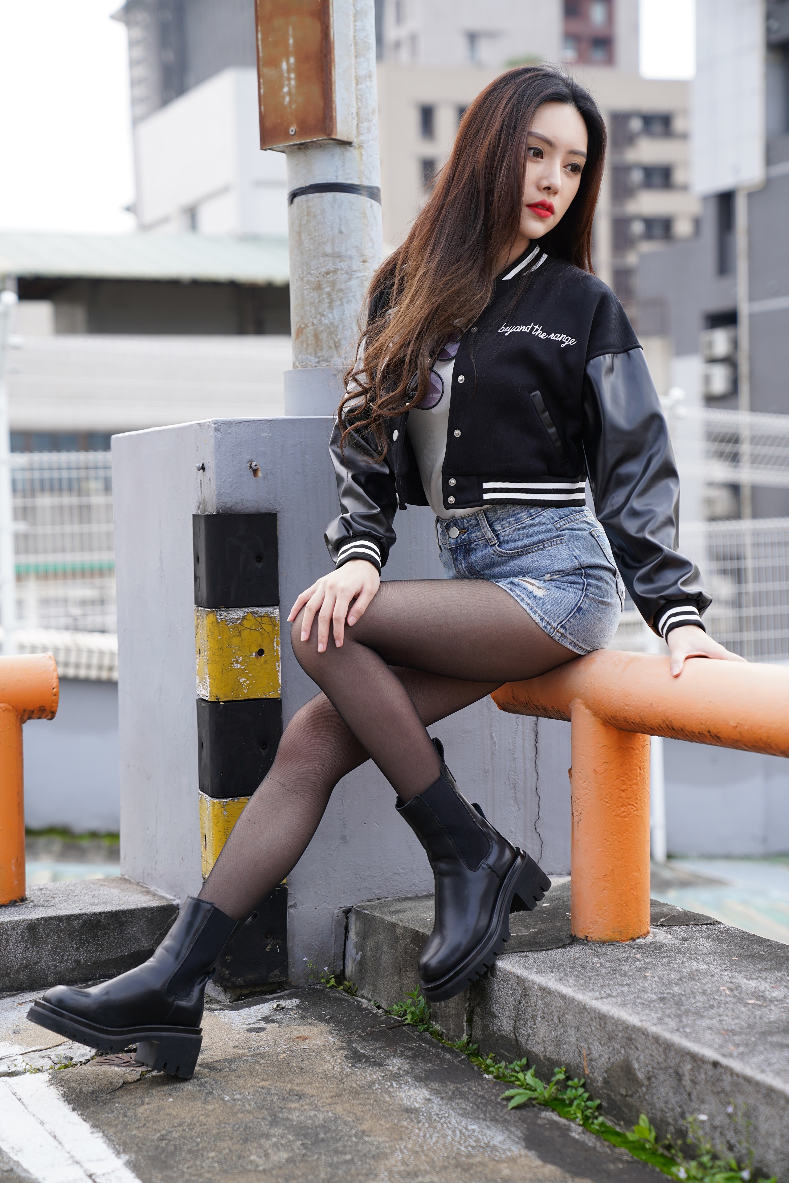 Asian woman with long brown hair wearing a jacket and shorts HD Phone Wallpaper