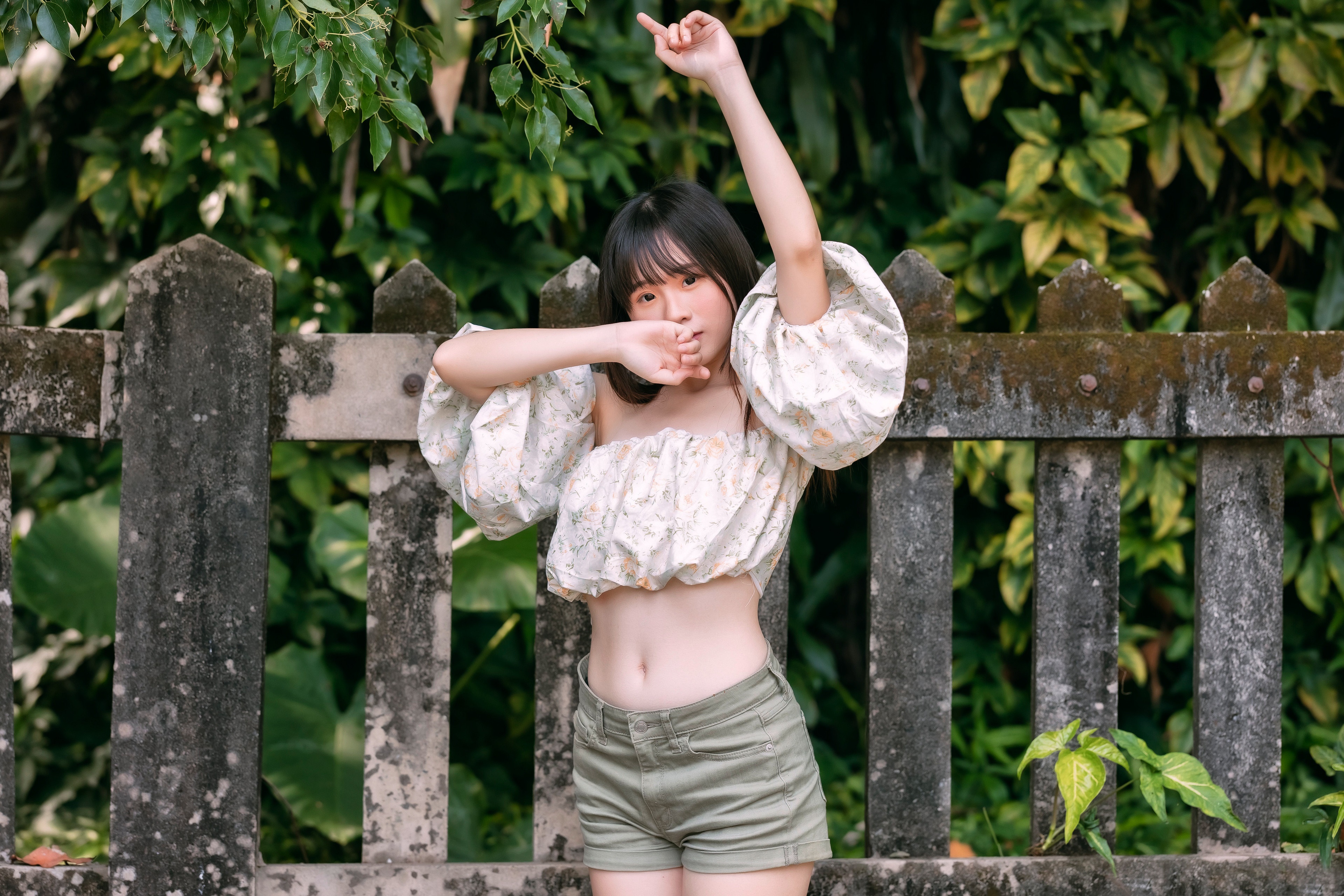 Asian girl in floral crop top and shorts posing HD Wallpaper