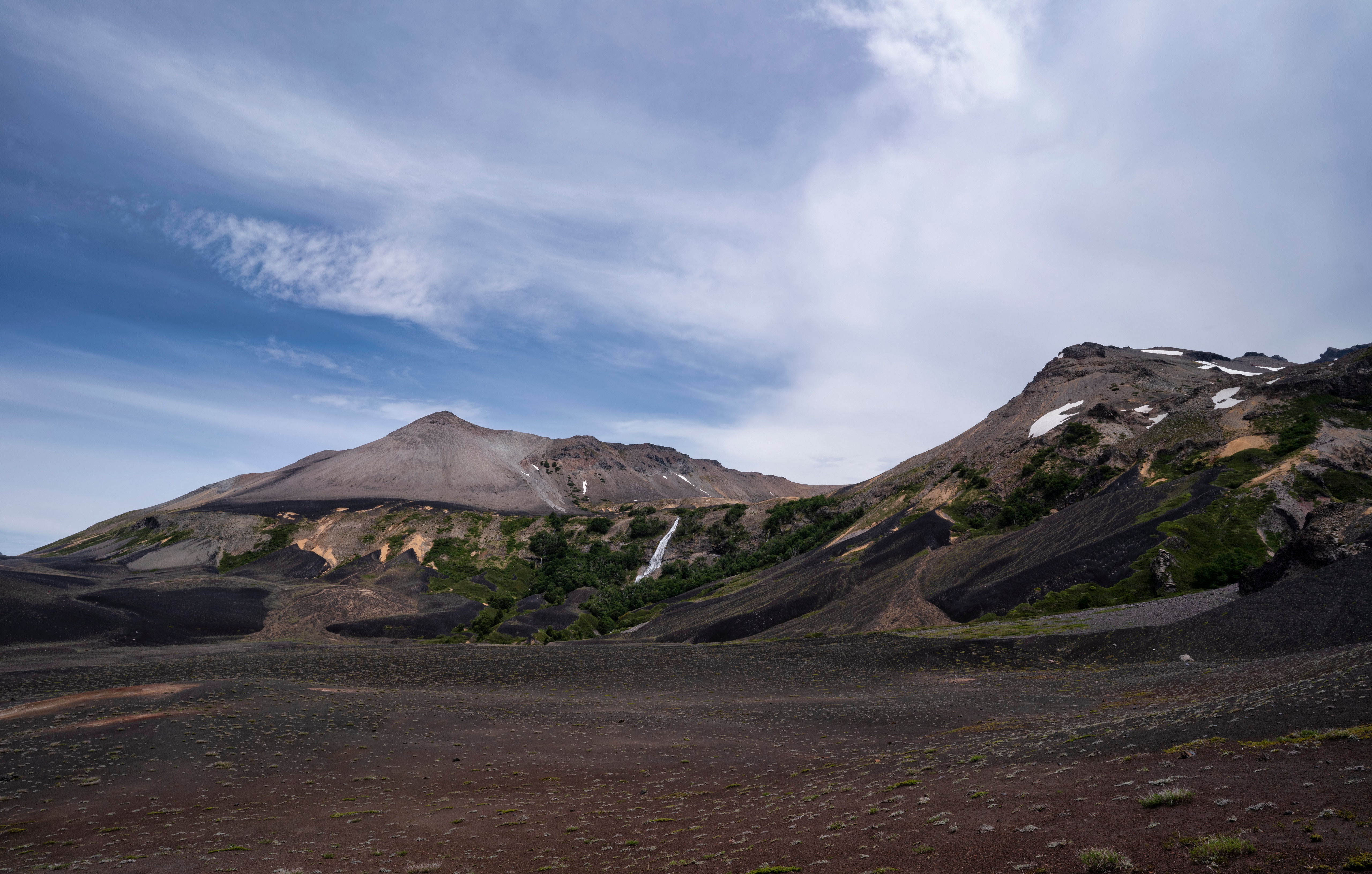 Volcanic mountains and waterfall in Argentina HD Wallpaper