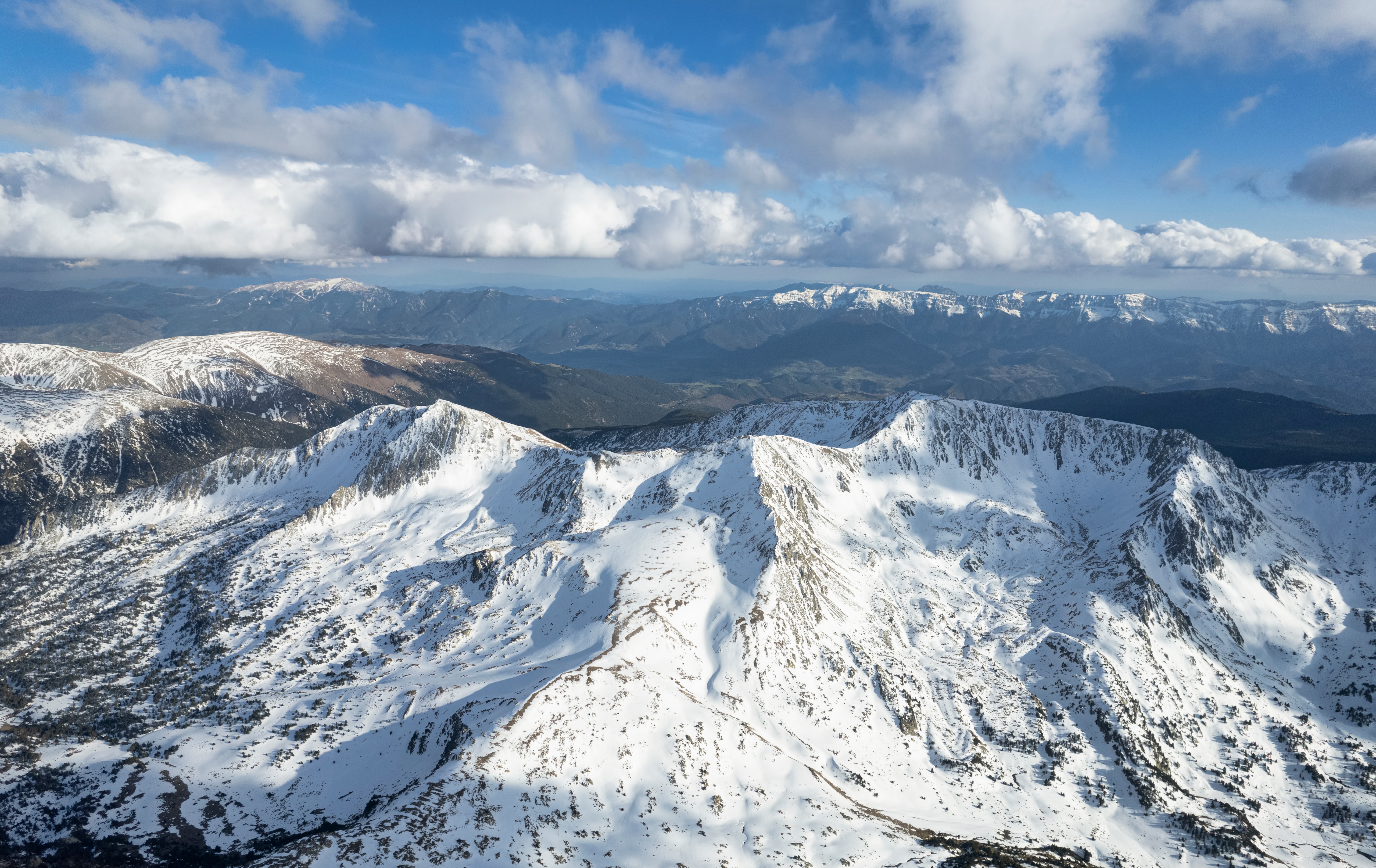 Snowy Mountains in Andorra from Above with Clouds HD Wallpaper