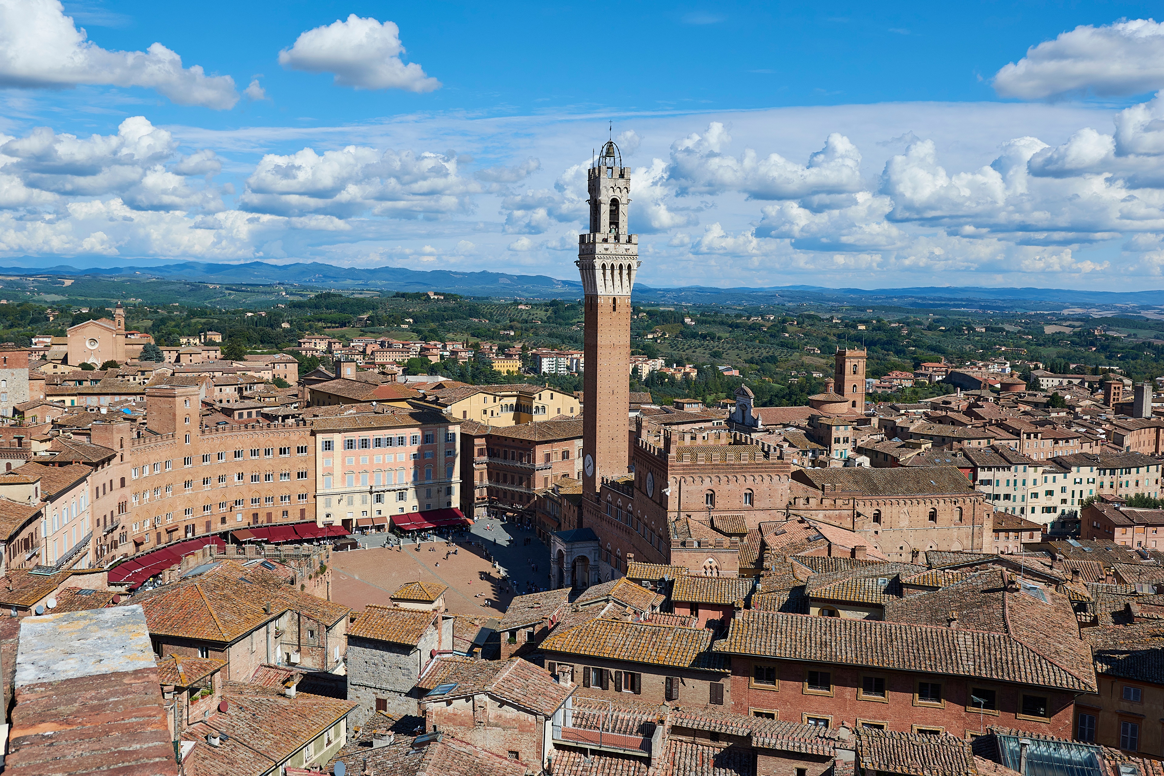 Siena, Italy cityscape with tower and clouds HD Wallpaper