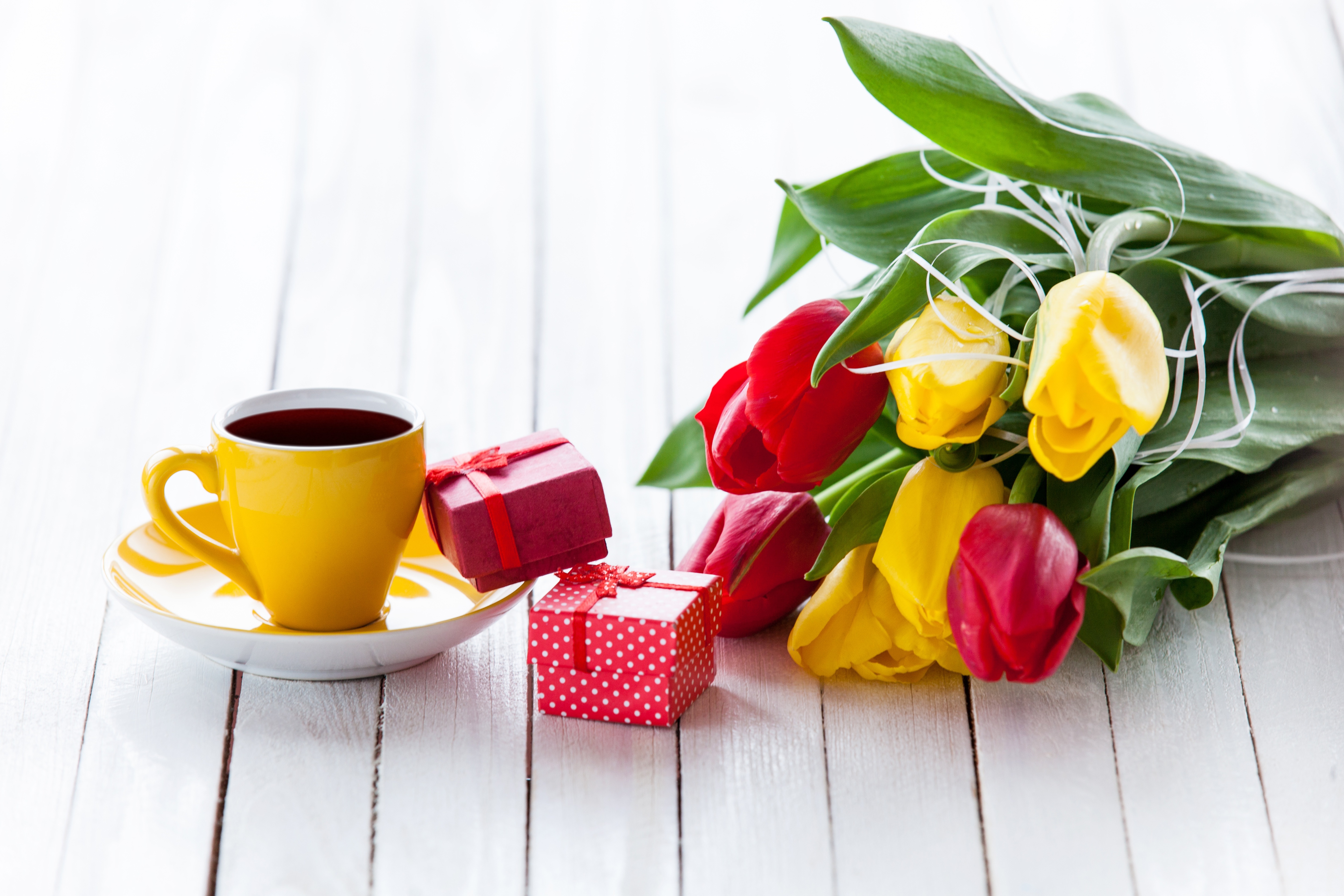 Tulips, Coffee, and Gifts on a White Table HD Wallpaper