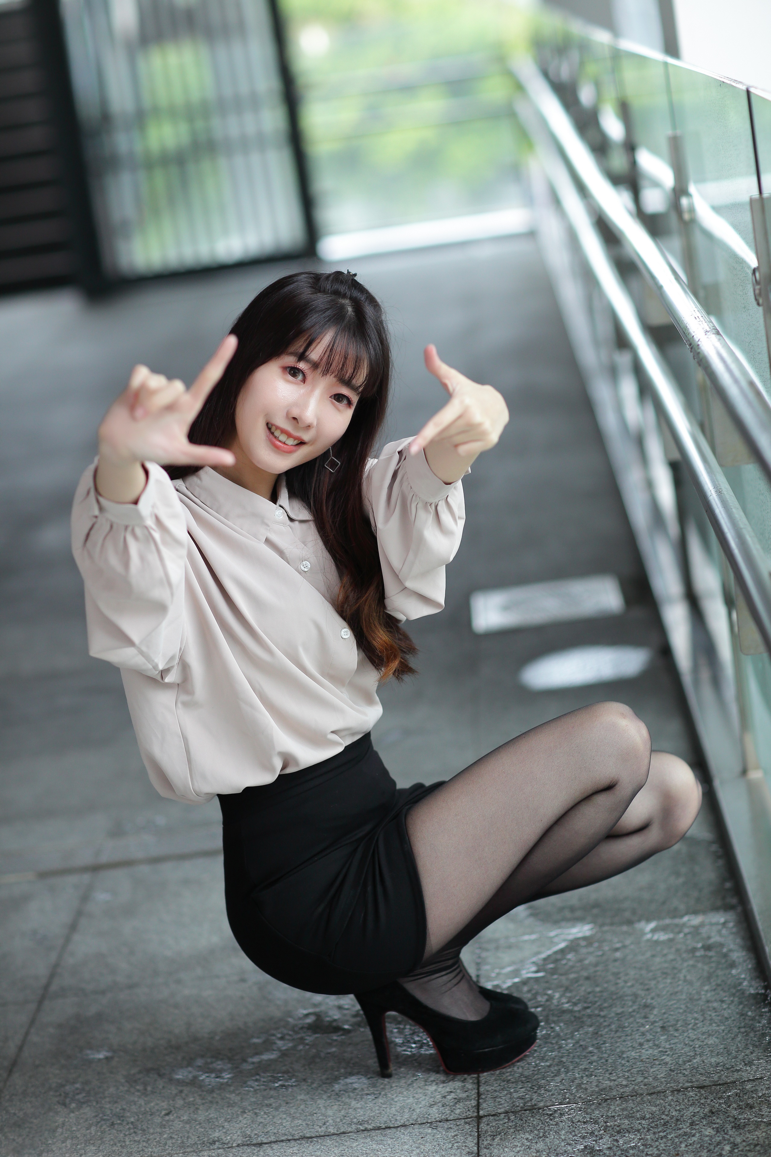 Asian woman in blouse and skirt posing HD Phone Wallpaper