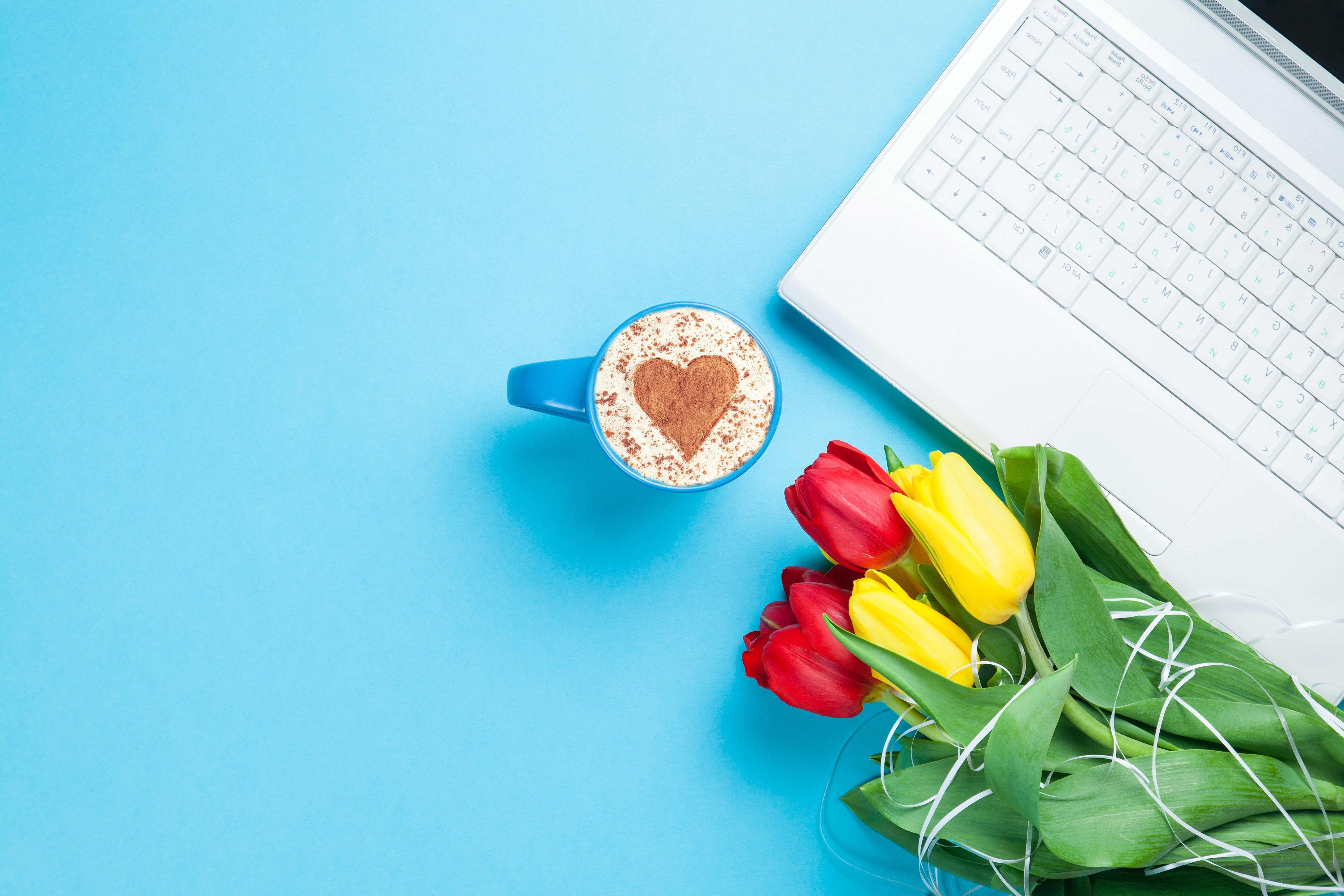 Coffee with heart art, tulips, and laptop HD Wallpaper