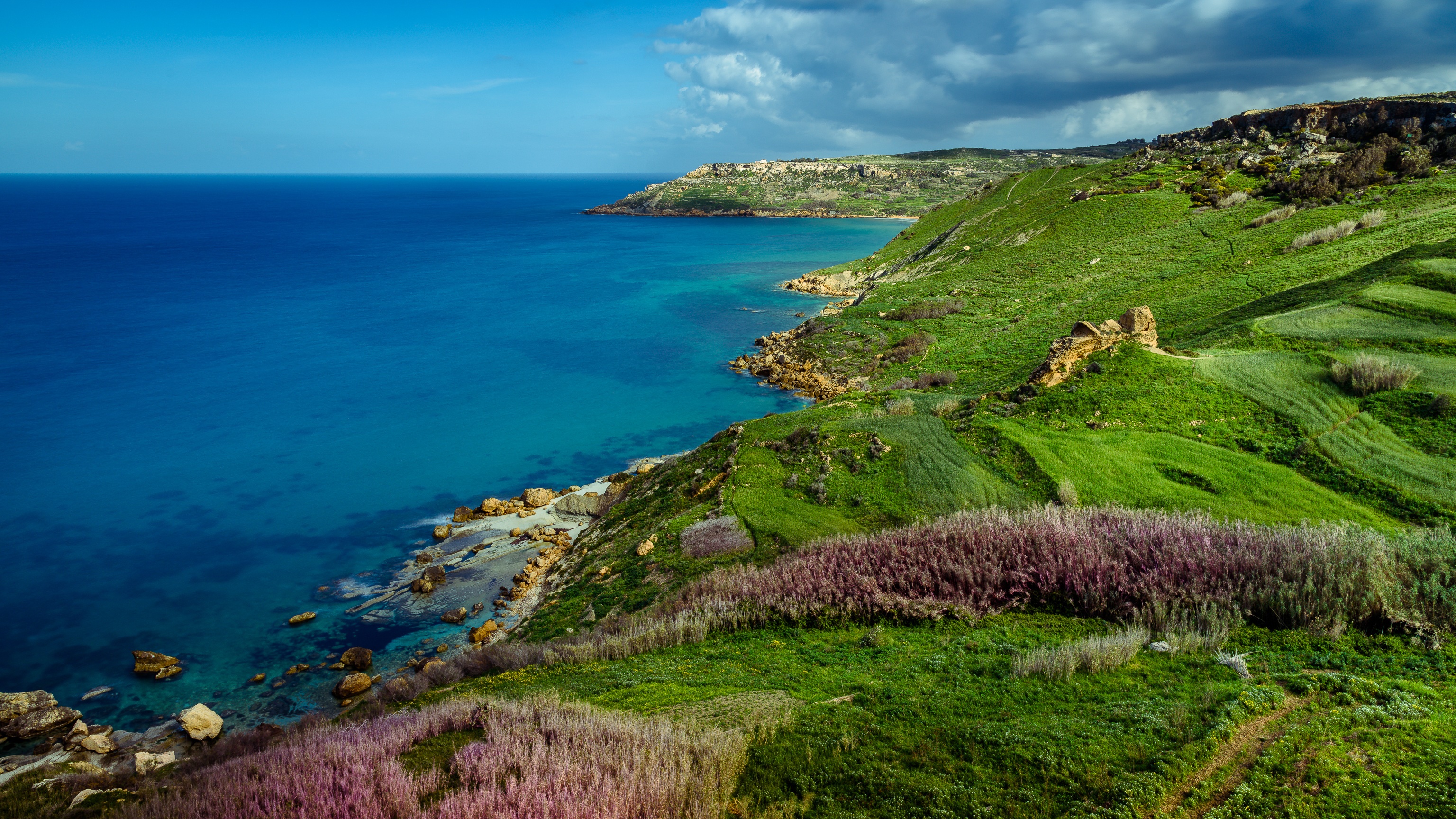 Green hills and blue sea on the coast of Gozo, Malta HD Wallpaper