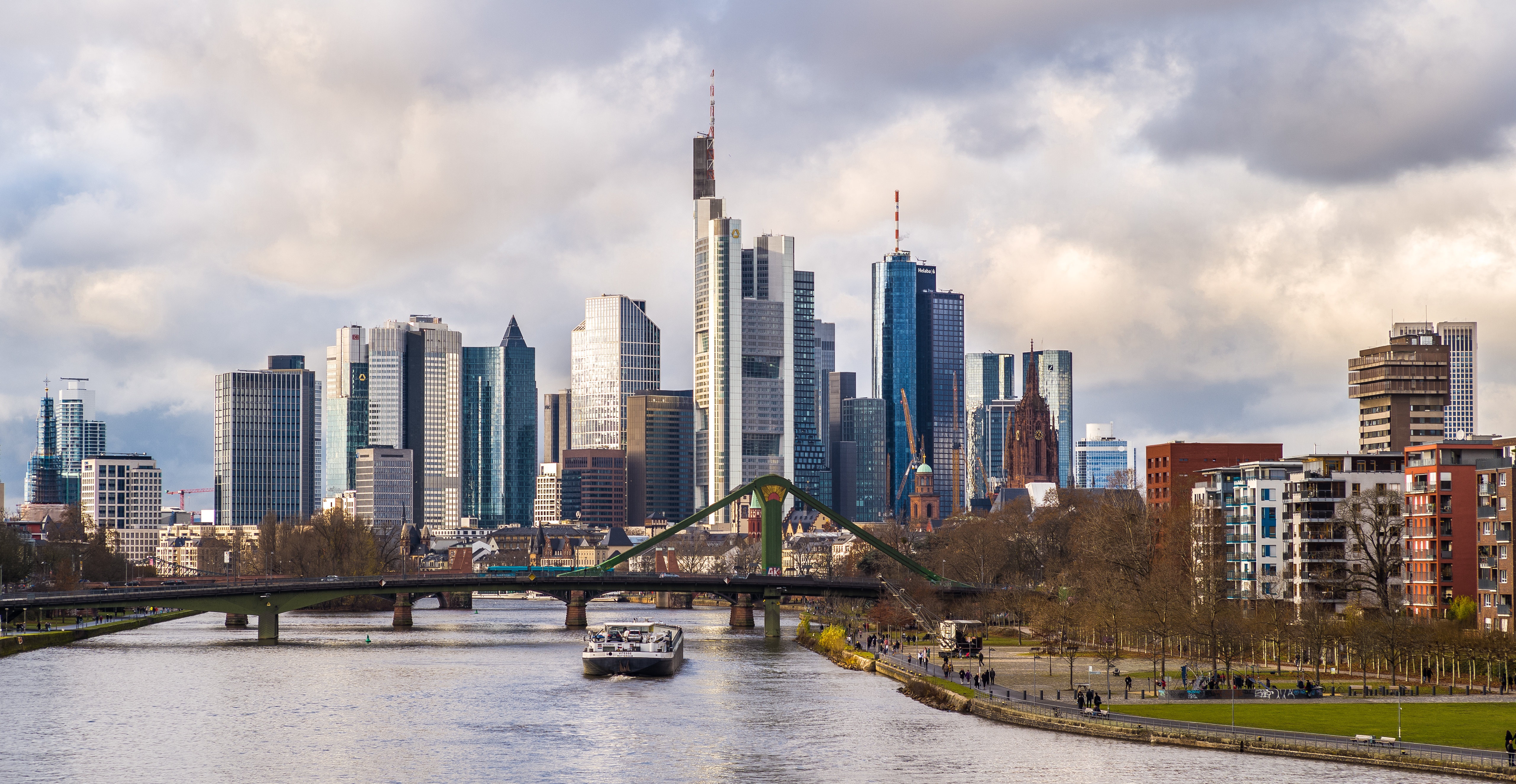 Frankfurt skyline with river and bridge HD Wallpaper