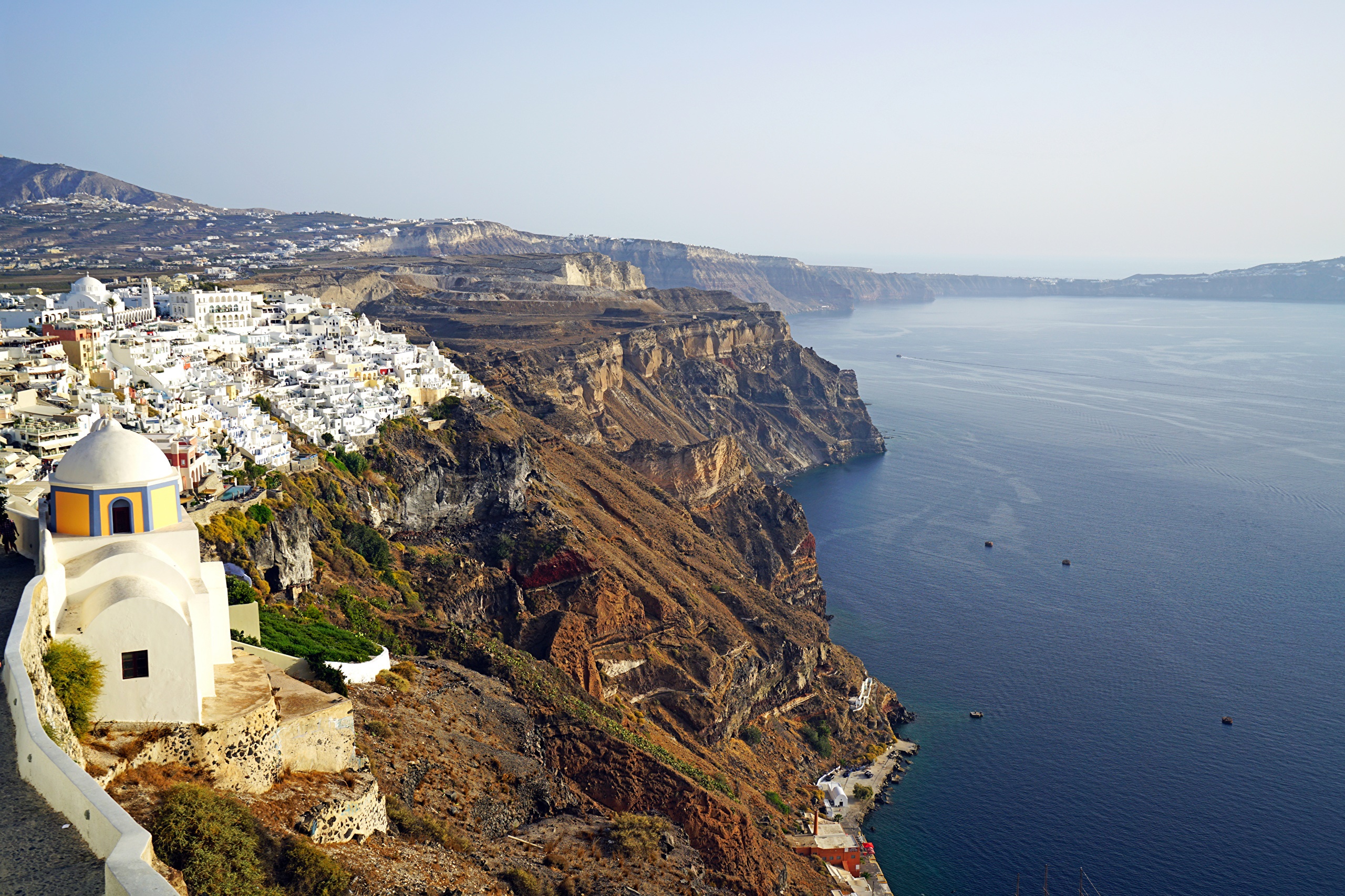 Santorini, Greece: White Houses on a Cliff Overlooking the Sea HD Wallpaper