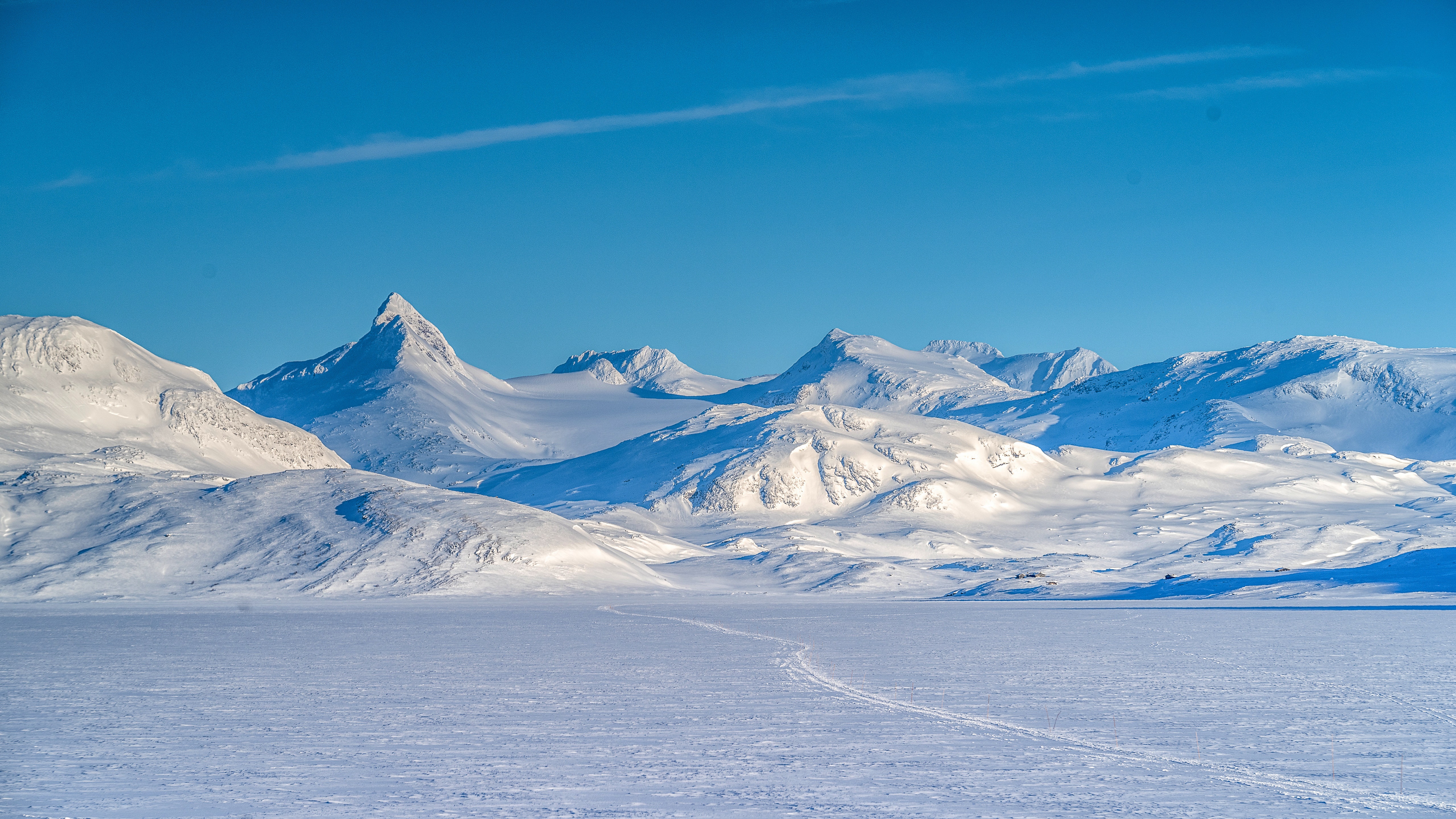Snowy mountains and frozen lake in Norway HD Wallpaper