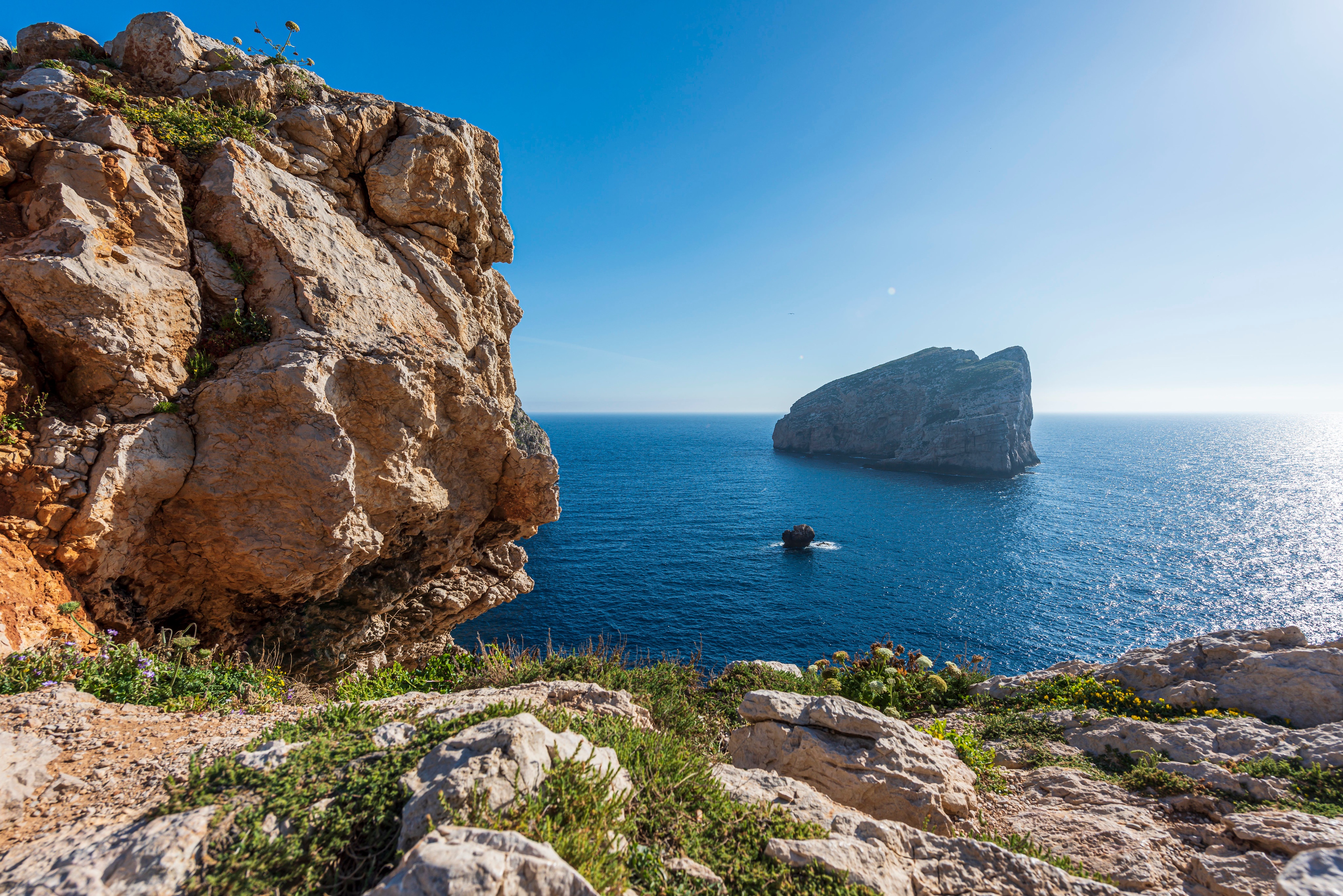 Rocky coast and sea stacks in Alghero, Italy HD Wallpaper