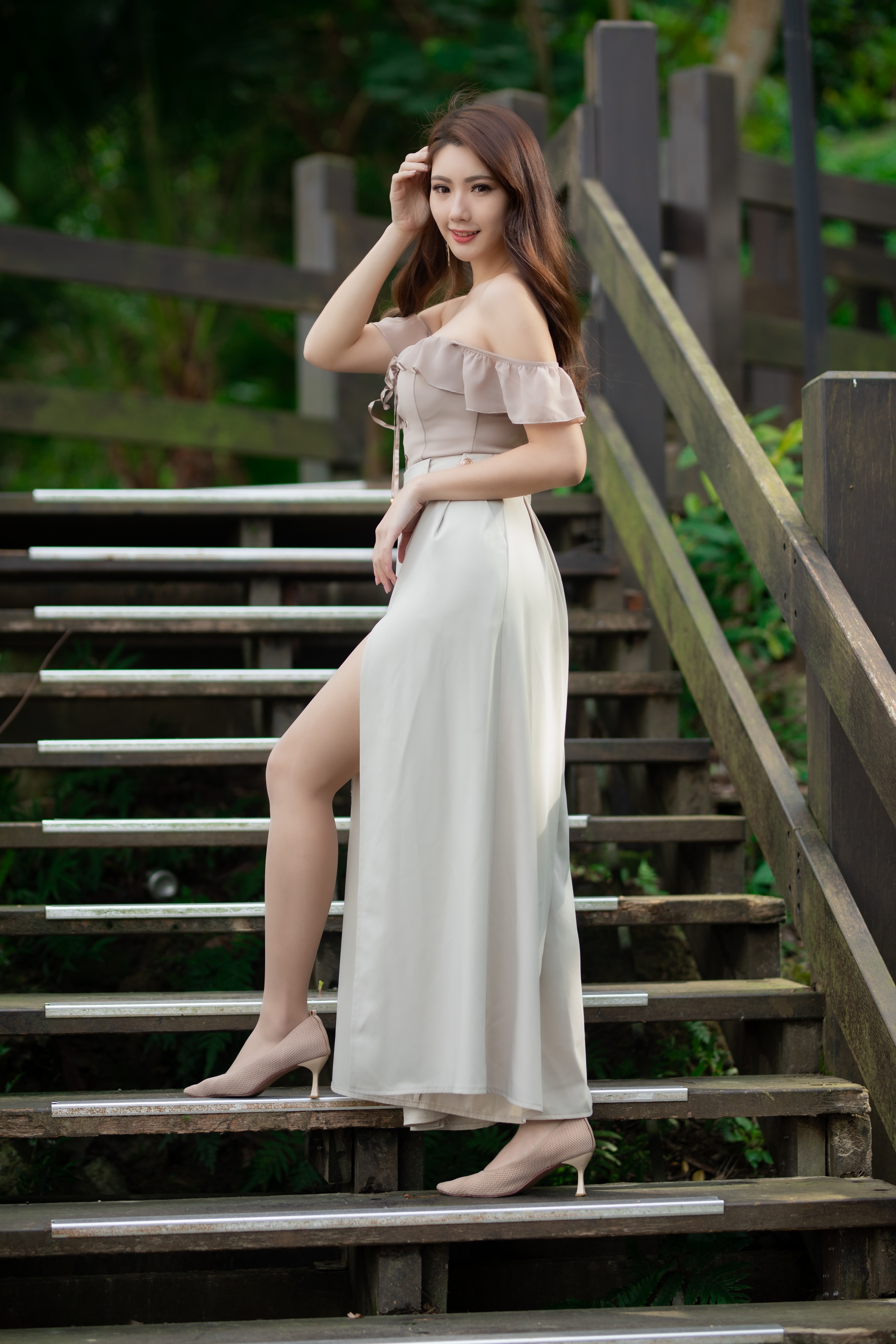 Asian woman in a dress on wooden stairs HD Phone Wallpaper