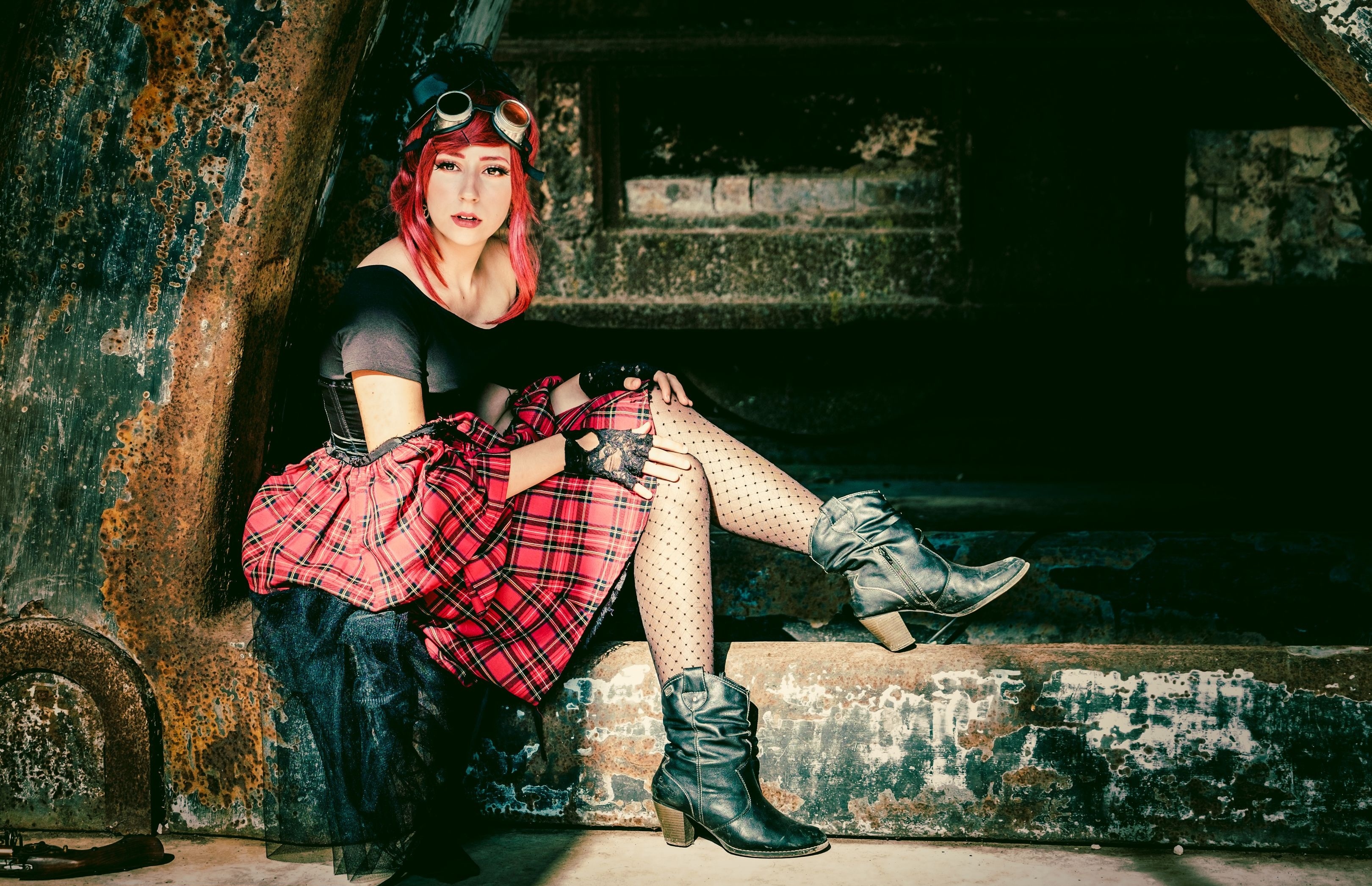 Steampunk woman with red hair wearing goggles and plaid skirt HD Wallpaper