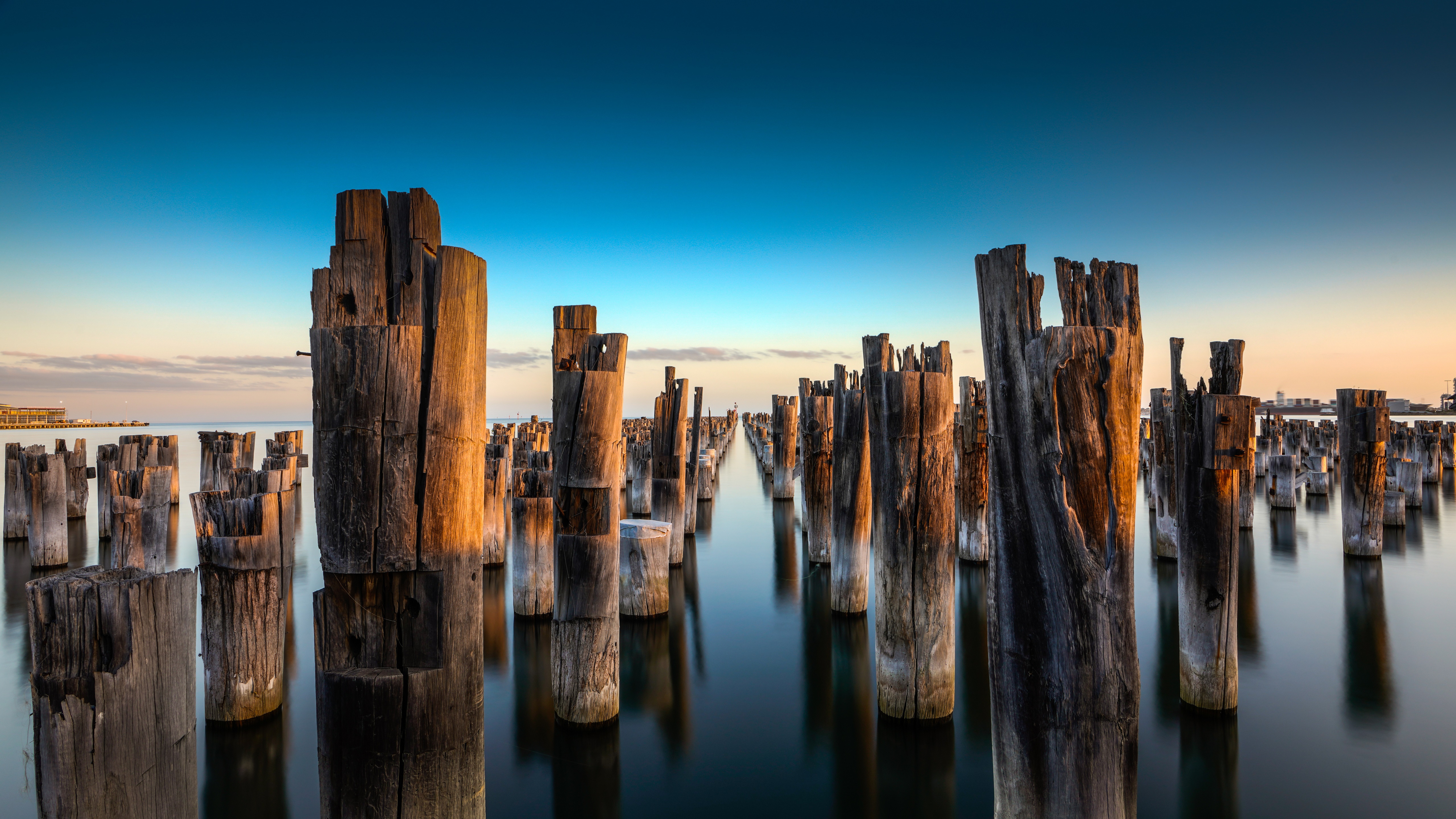 Princes Pier Melbourne Australia wooden pilings at sunset HD Wallpaper
