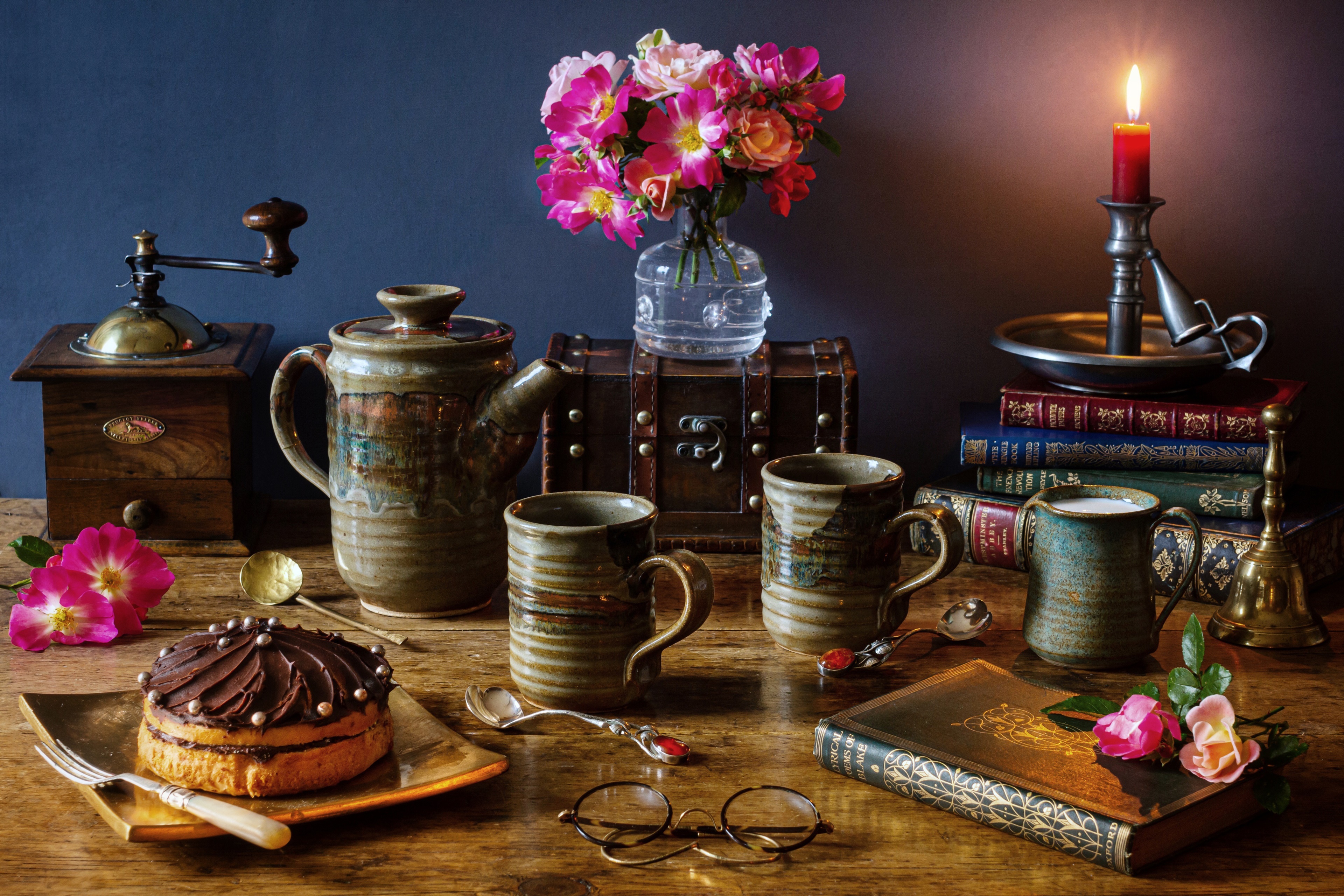 Still-life with cake, coffee set, books, and candle HD Wallpaper