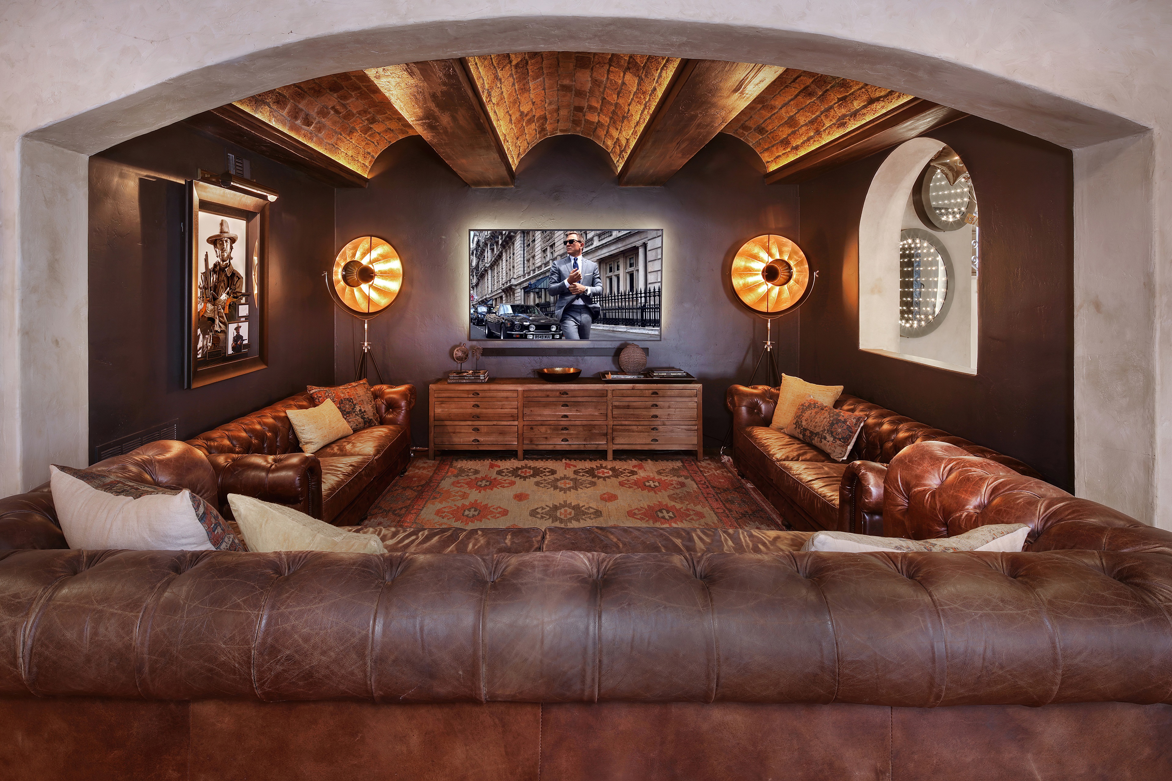 Living room with leather sofas and TV HD Wallpaper