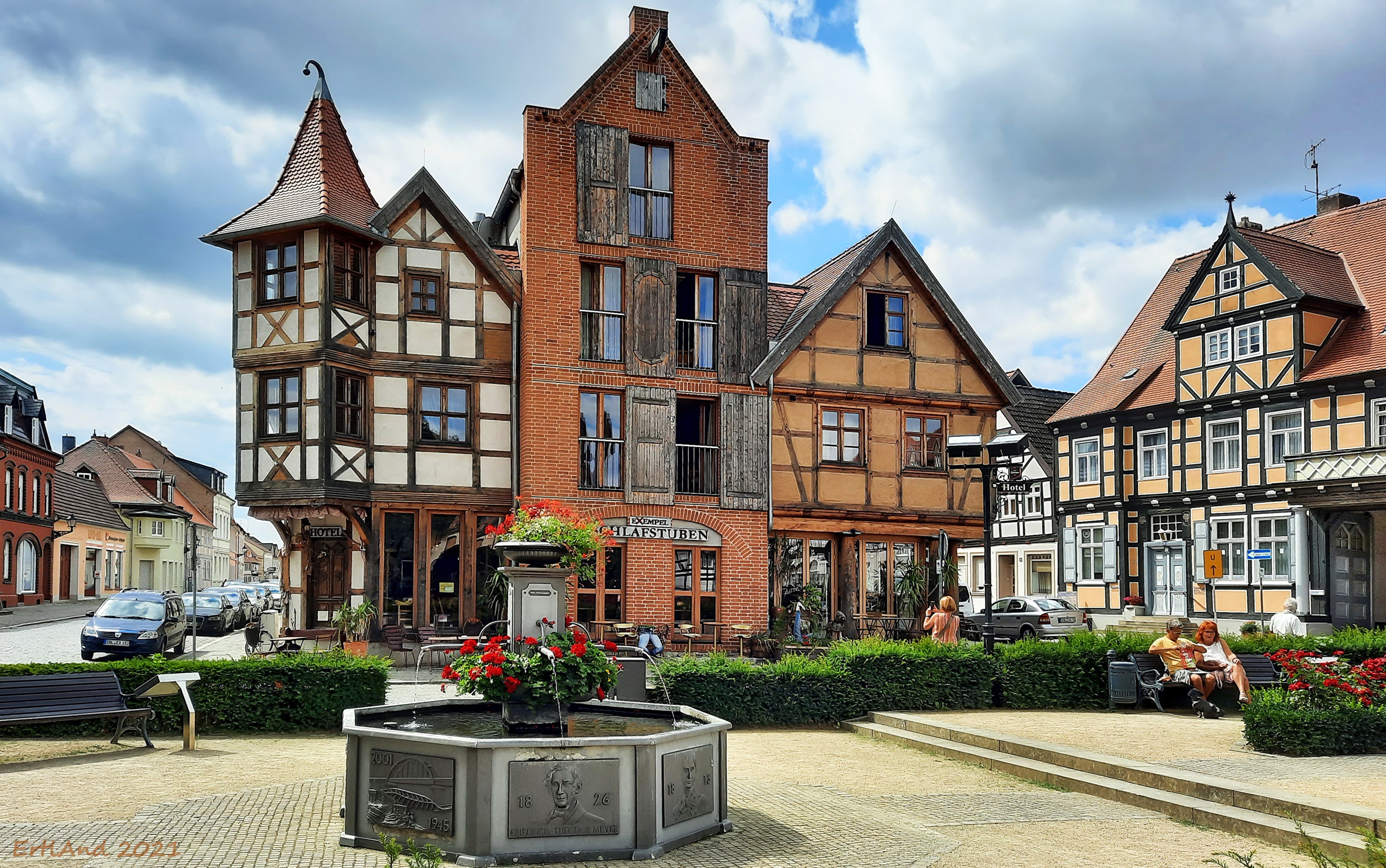 Tangermunde town square with historic buildings and fountain HD Wallpaper