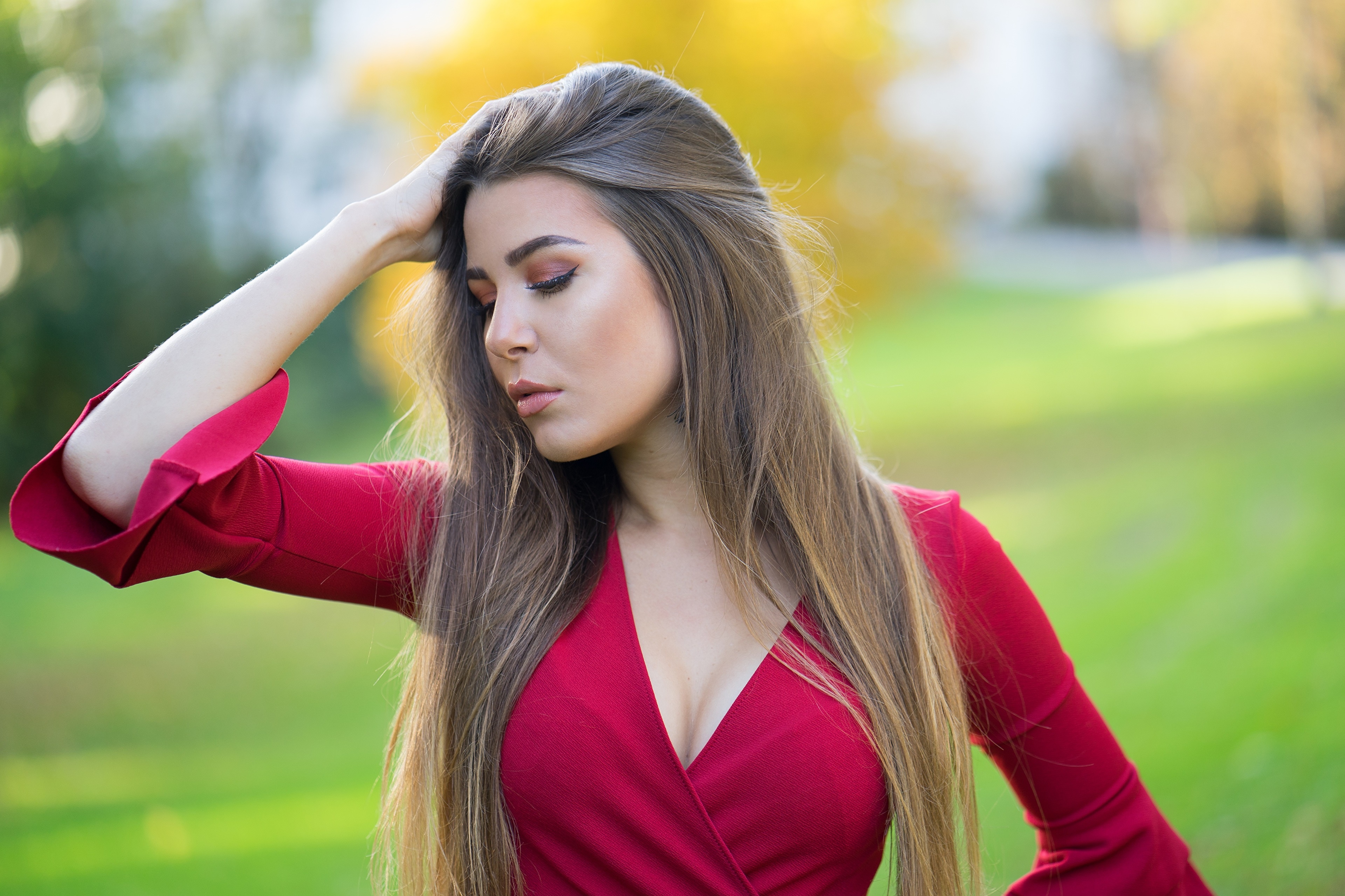 Woman with dark blonde hair in red dress HD Wallpaper