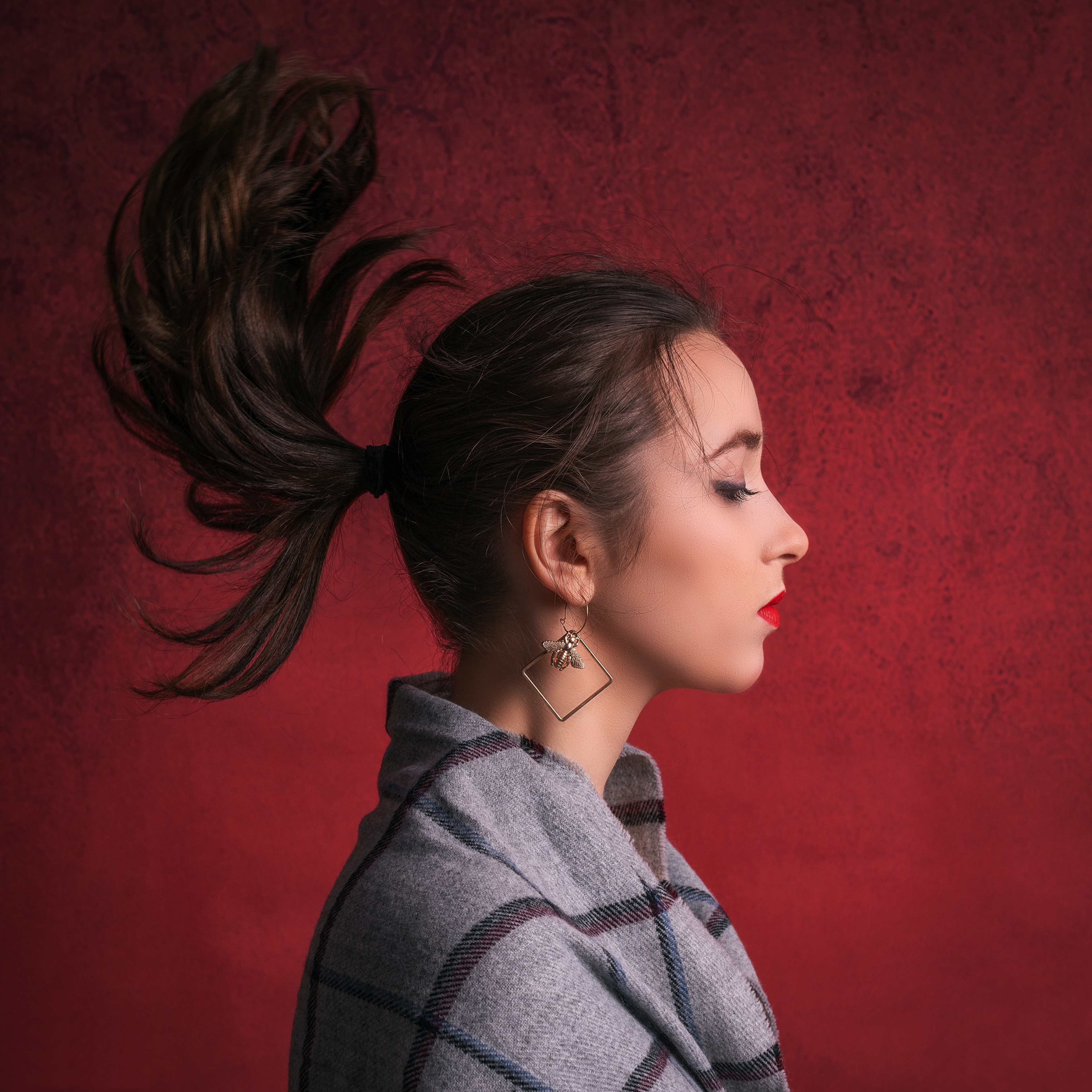 Woman with high ponytail and bee earring HD Wallpaper
