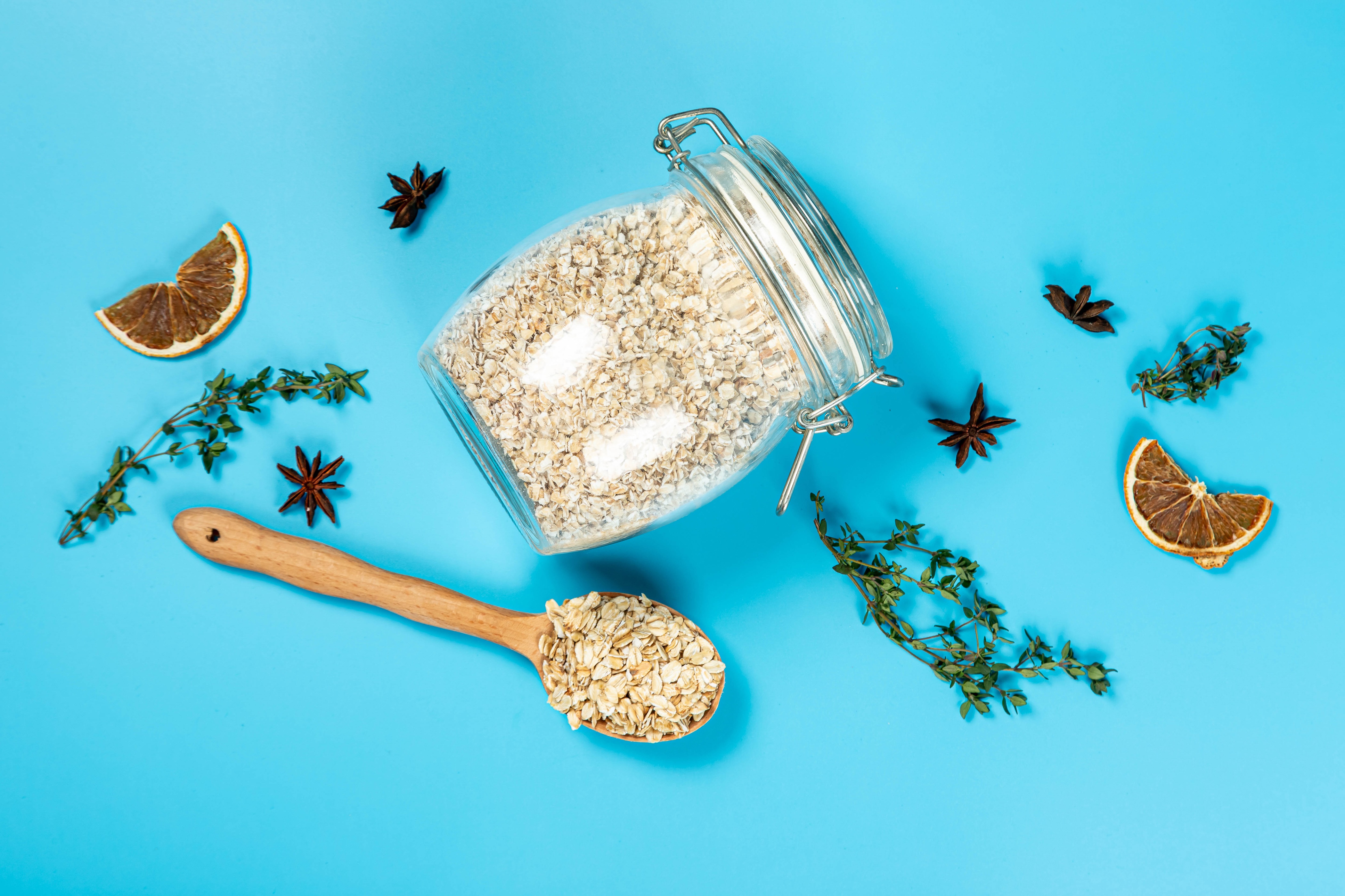 Oatmeal in a jar with star anise and dried orange slices HD Wallpaper