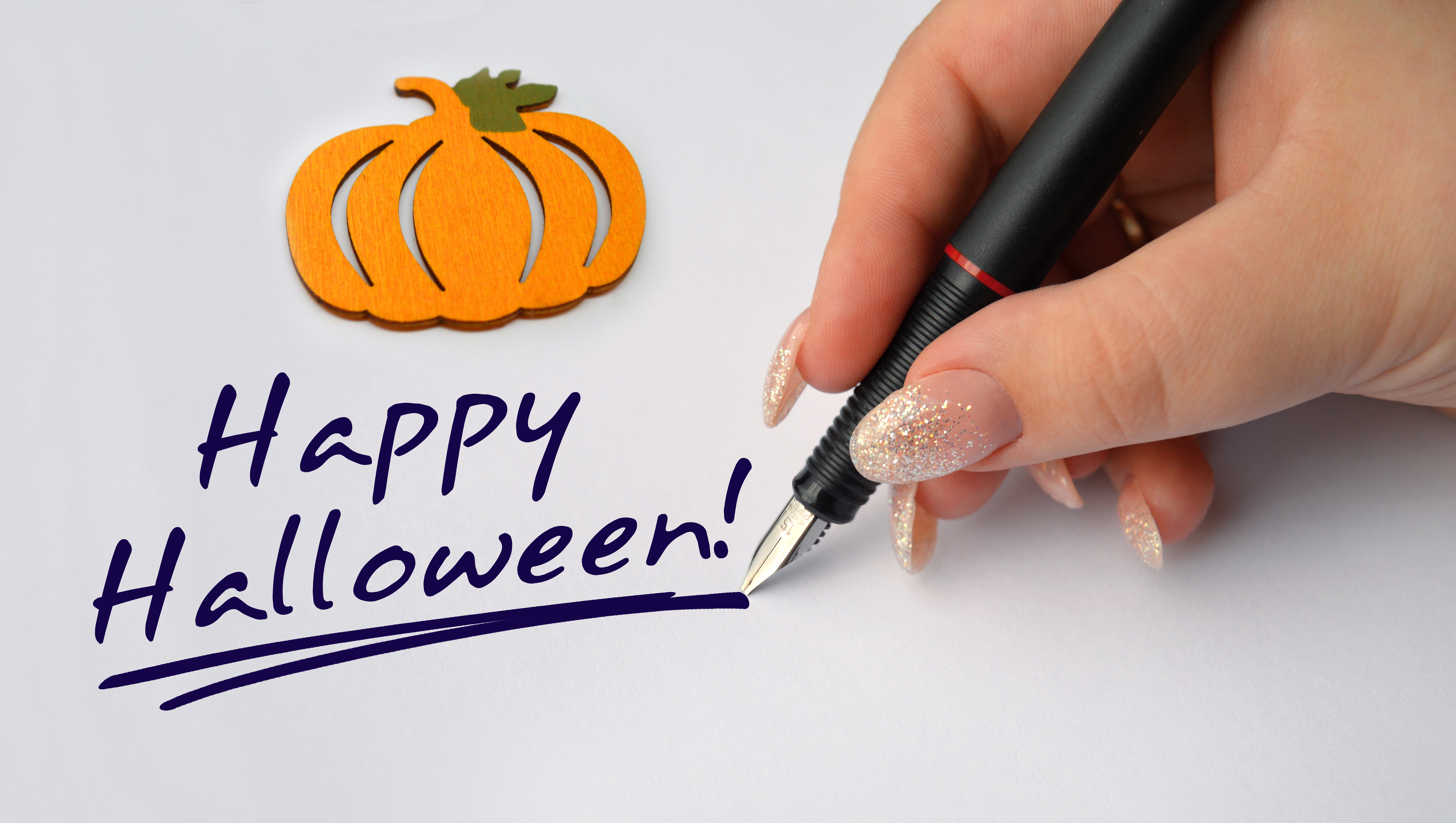Hand writing Happy Halloween with pumpkin decoration HD Wallpaper