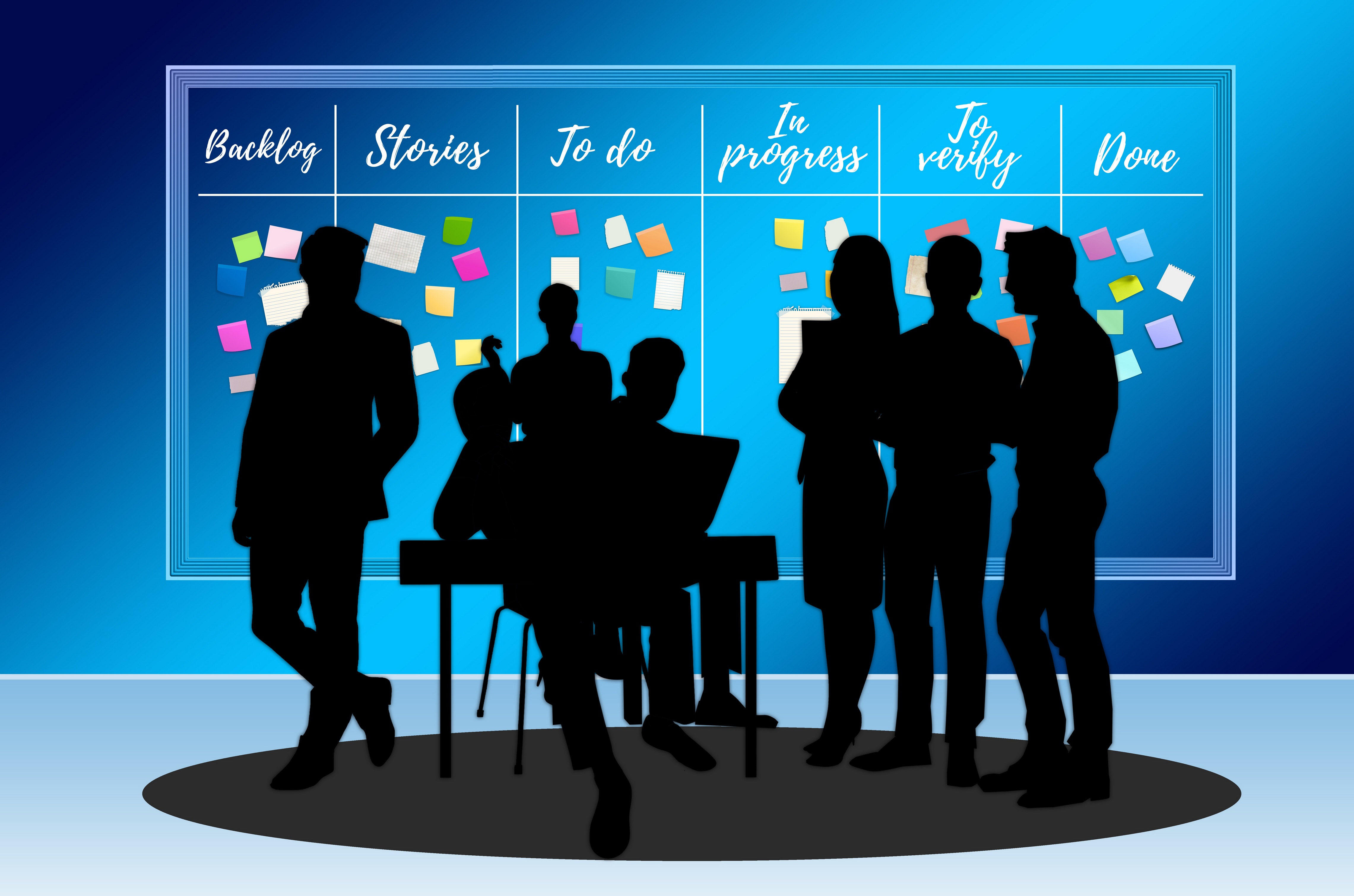 Silhouettes of people at a Kanban board HD Wallpaper