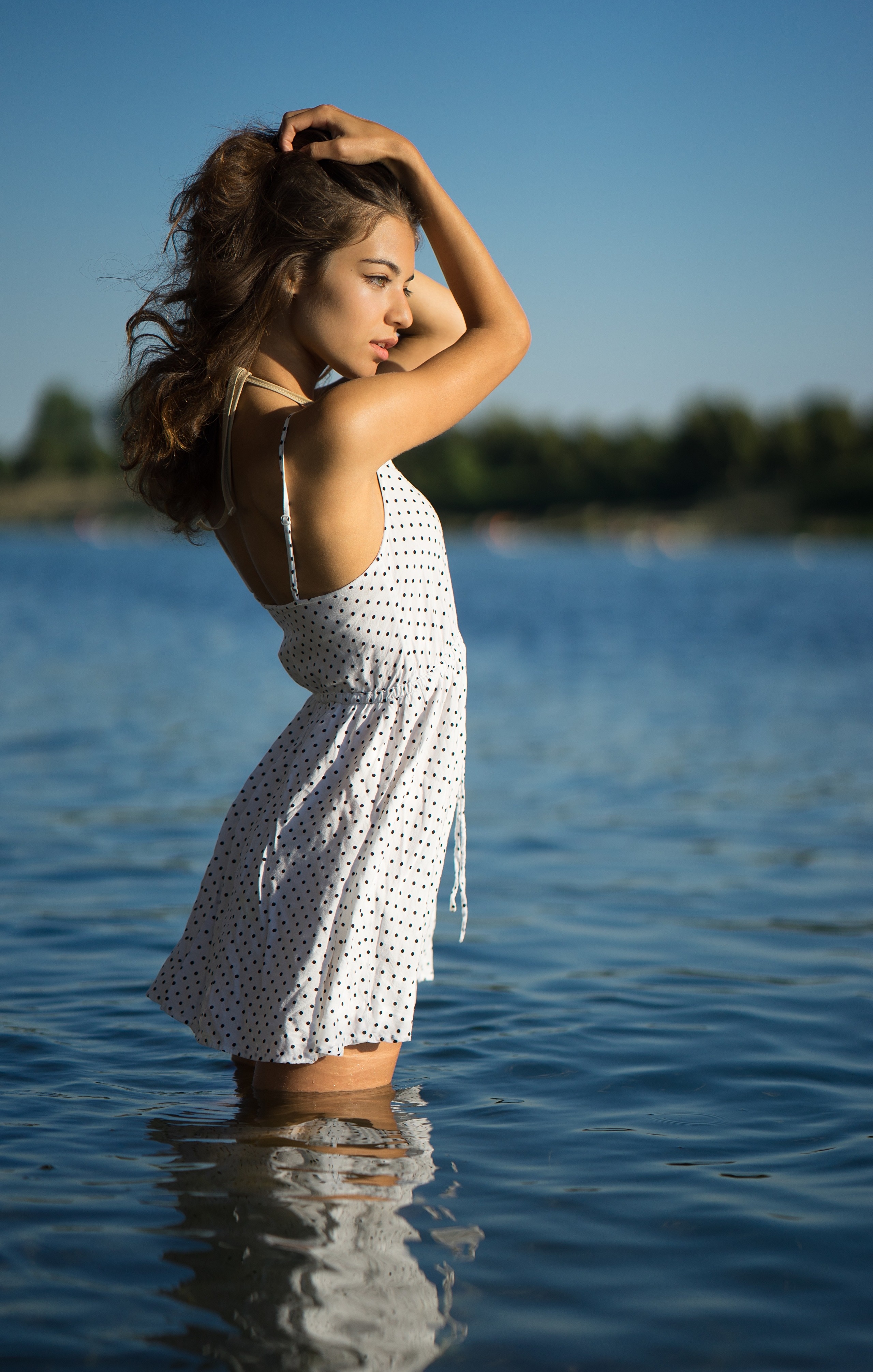 Ana in a polka dot dress standing in water HD Phone Wallpaper