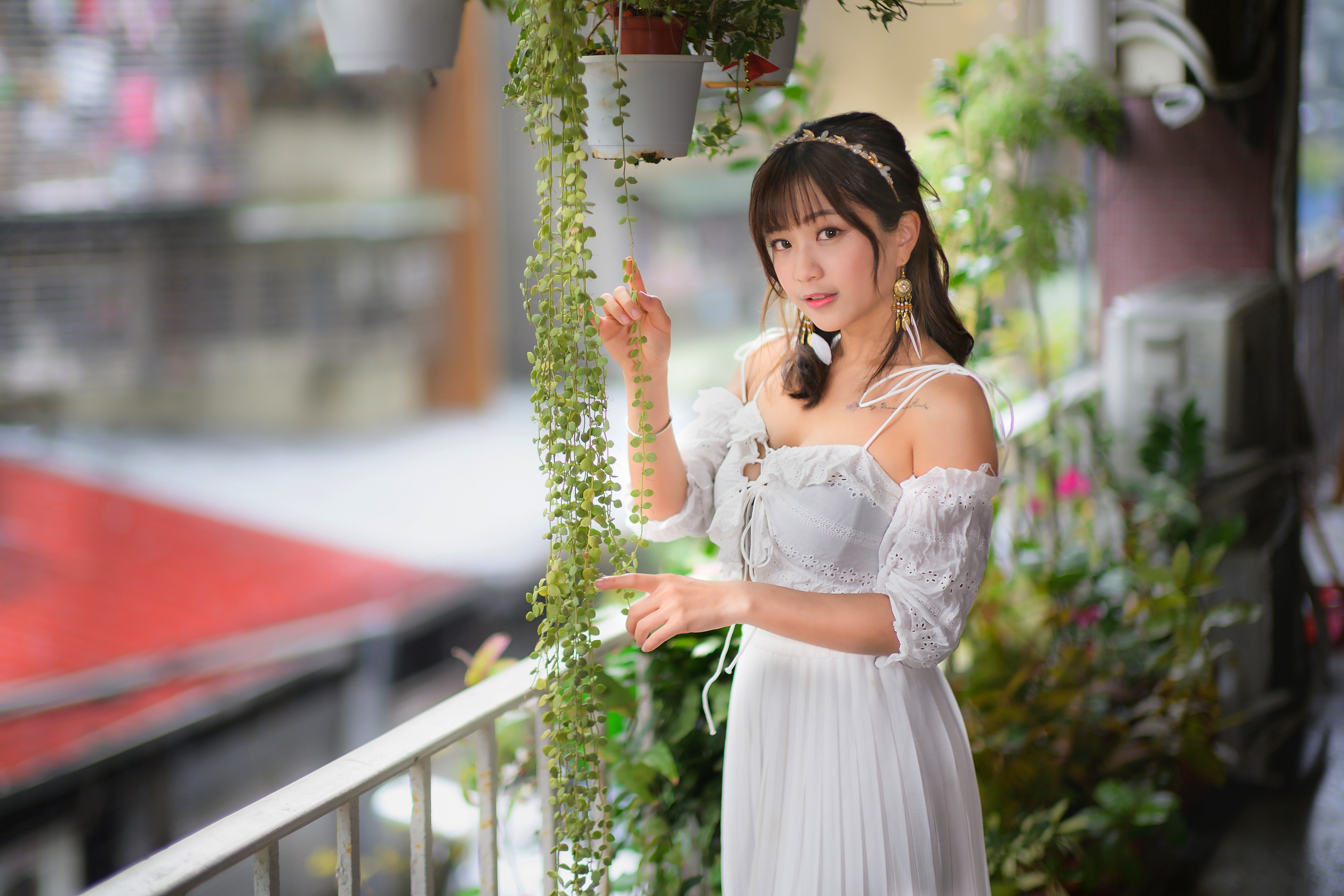 Asian woman in white dress with plants HD Wallpaper