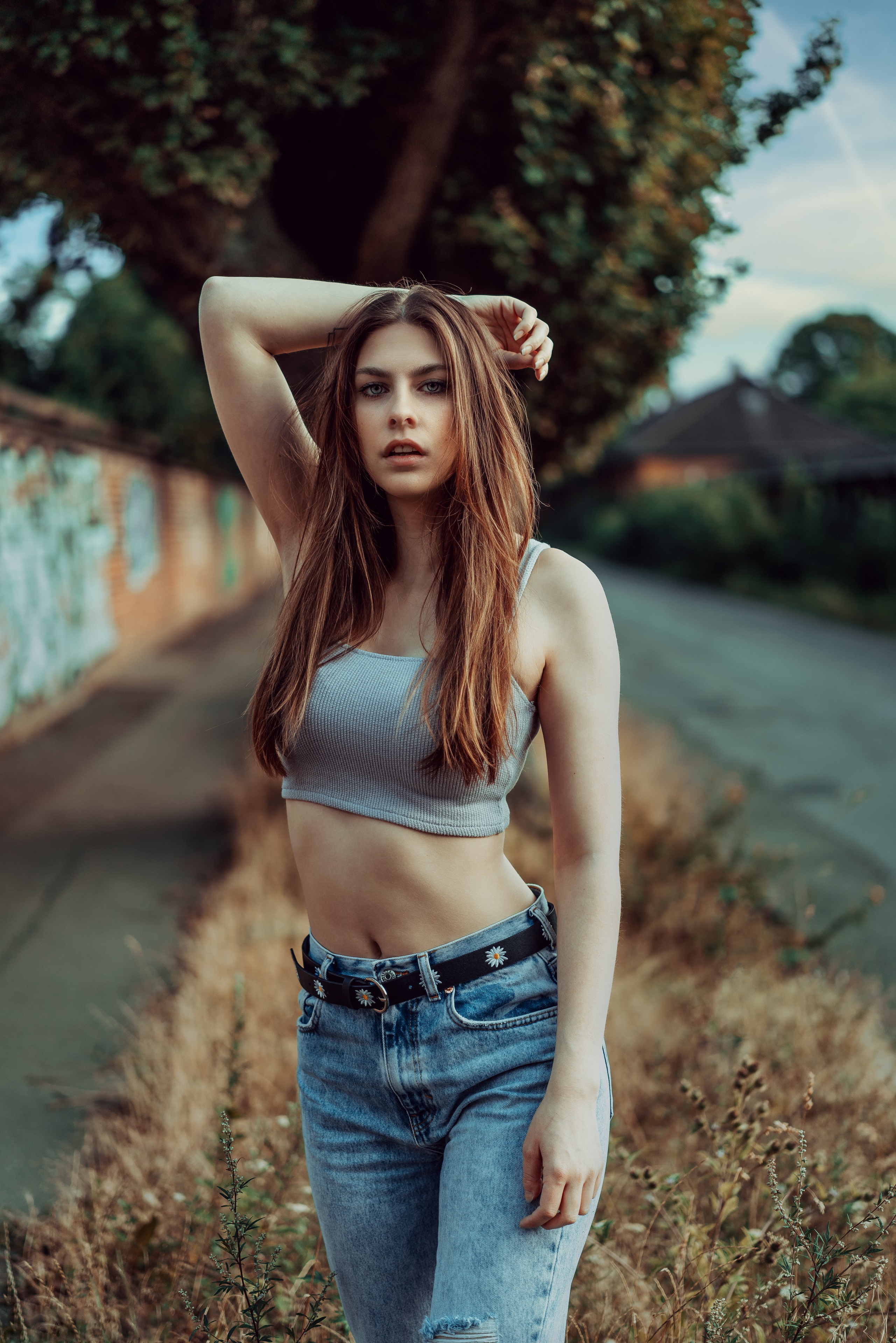 Beatrice Rogall in a grey singlet and jeans HD Phone Wallpaper