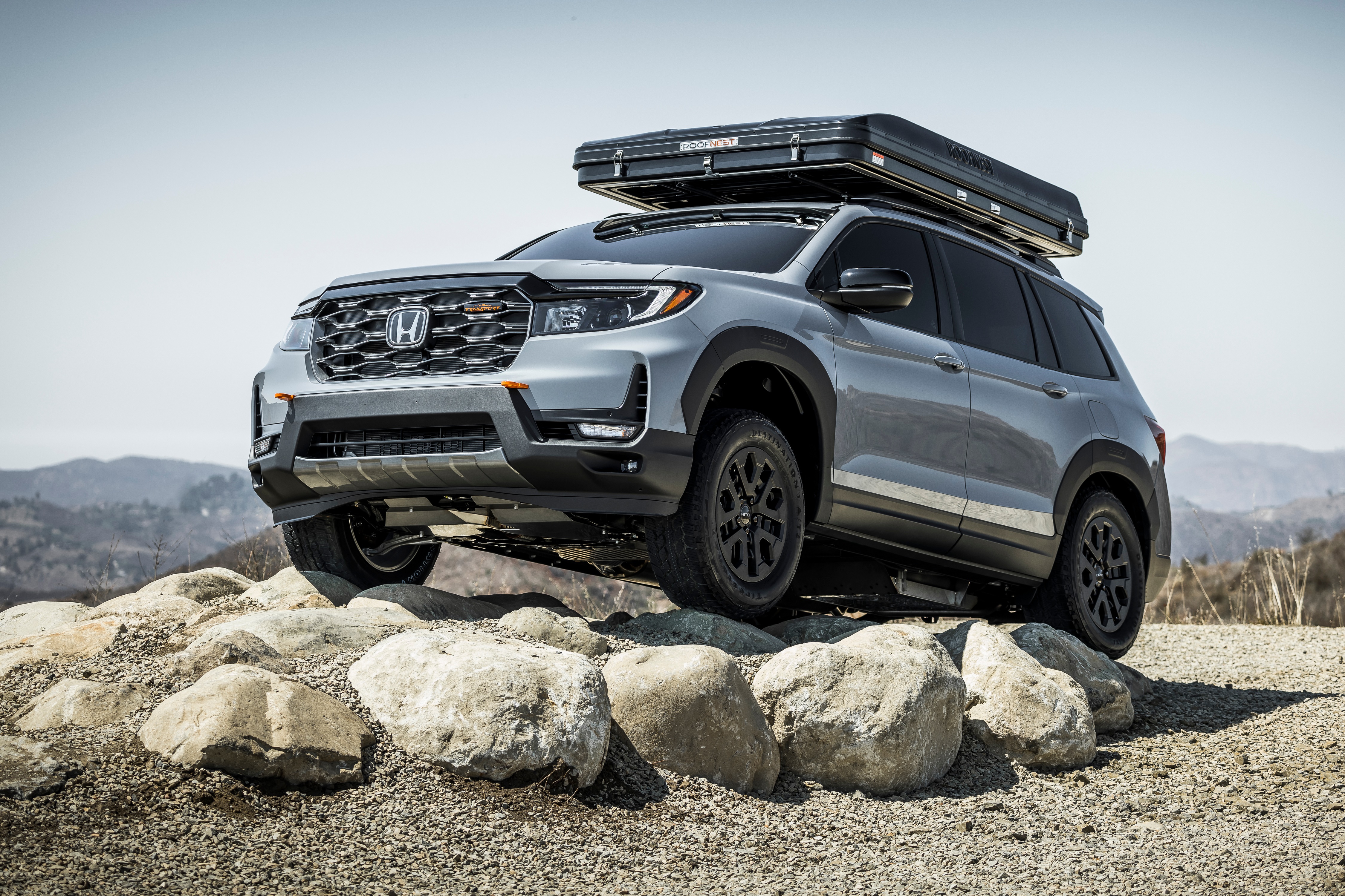 Honda Passport TrailSport SUV on Rocks with Roof Tent HD Wallpaper