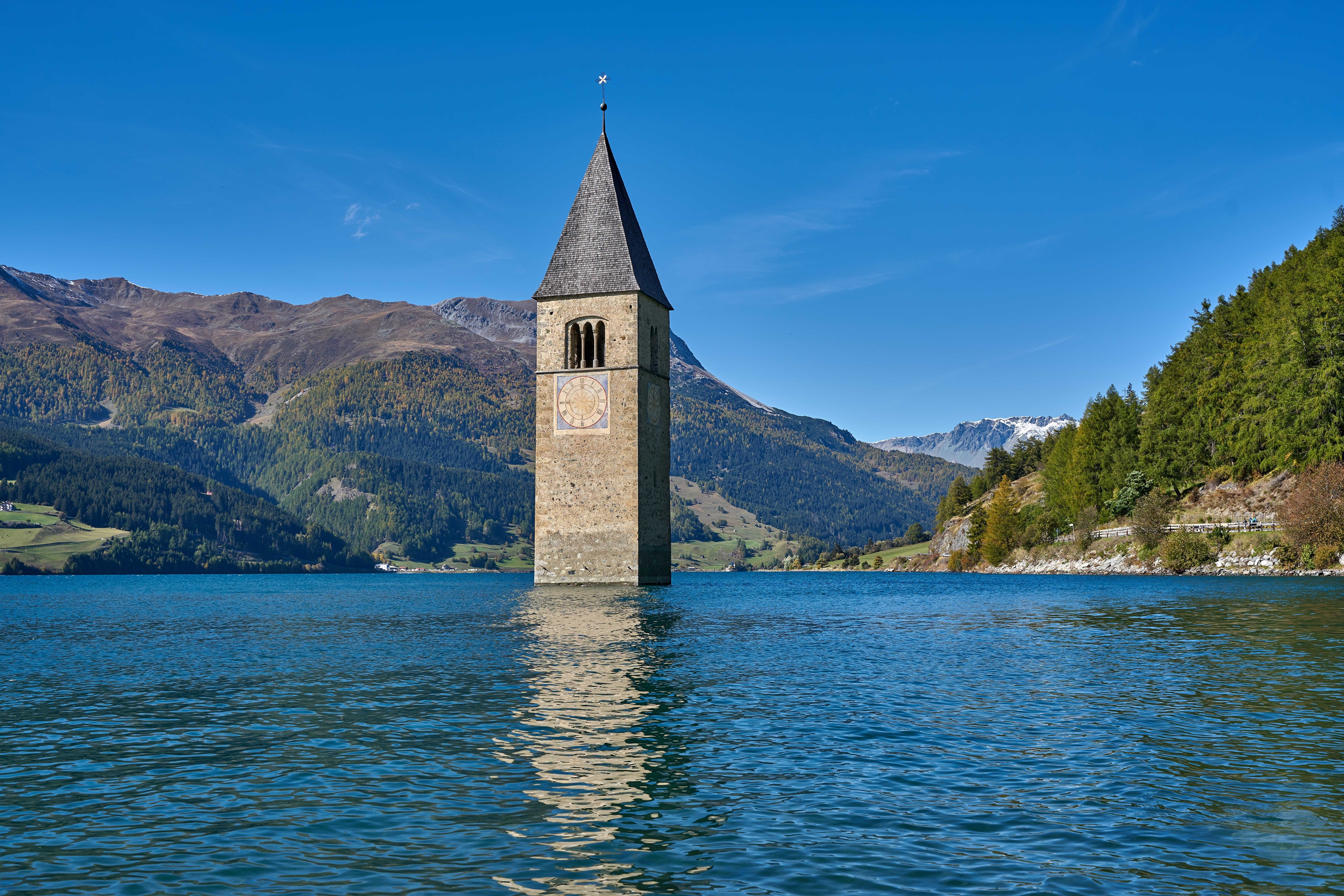 Sunken church tower in Reschensee, South Tyrol, Italy HD Wallpaper