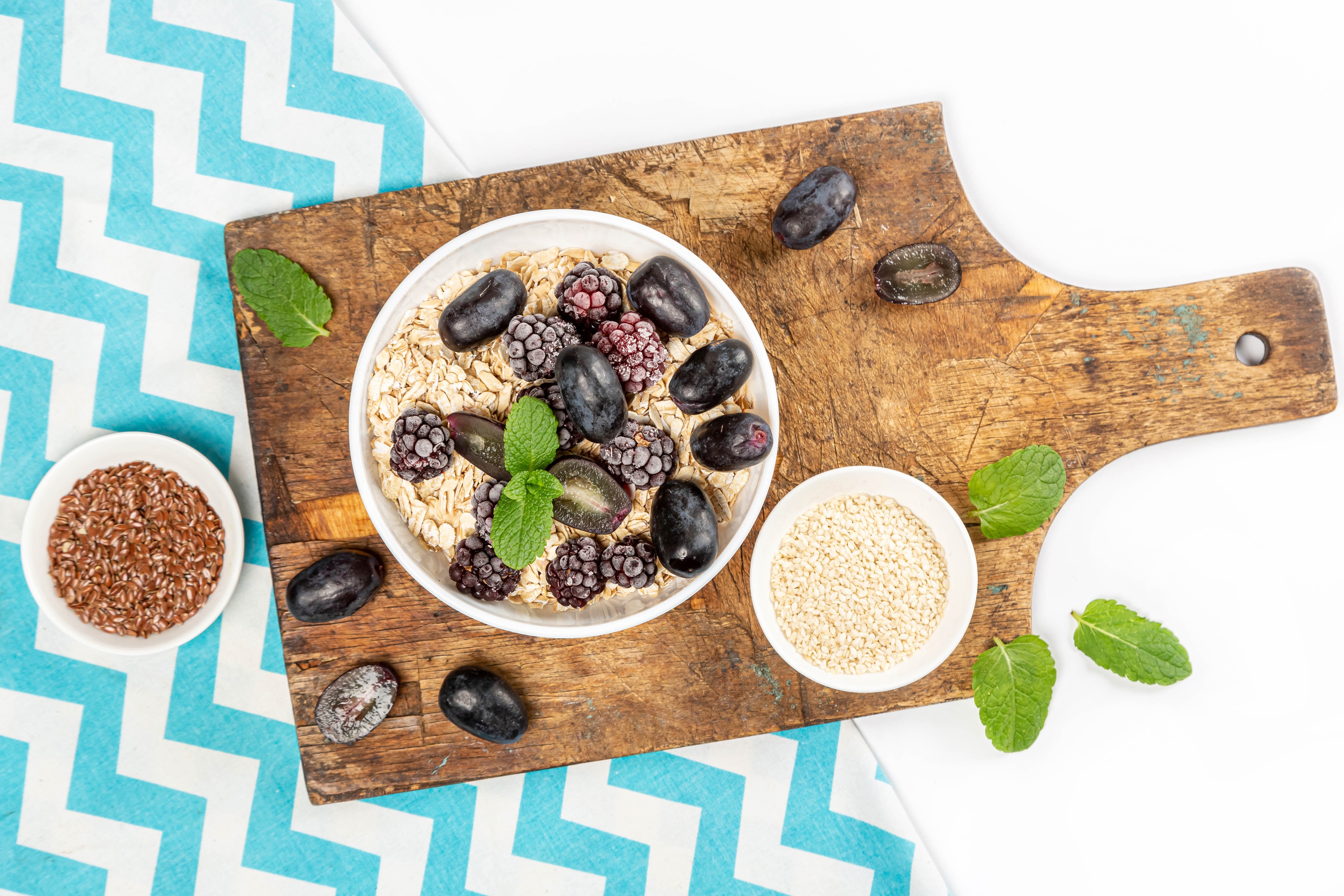 Oatmeal with Grapes, Blackberries, and Mint on a Cutting Board HD Wallpaper