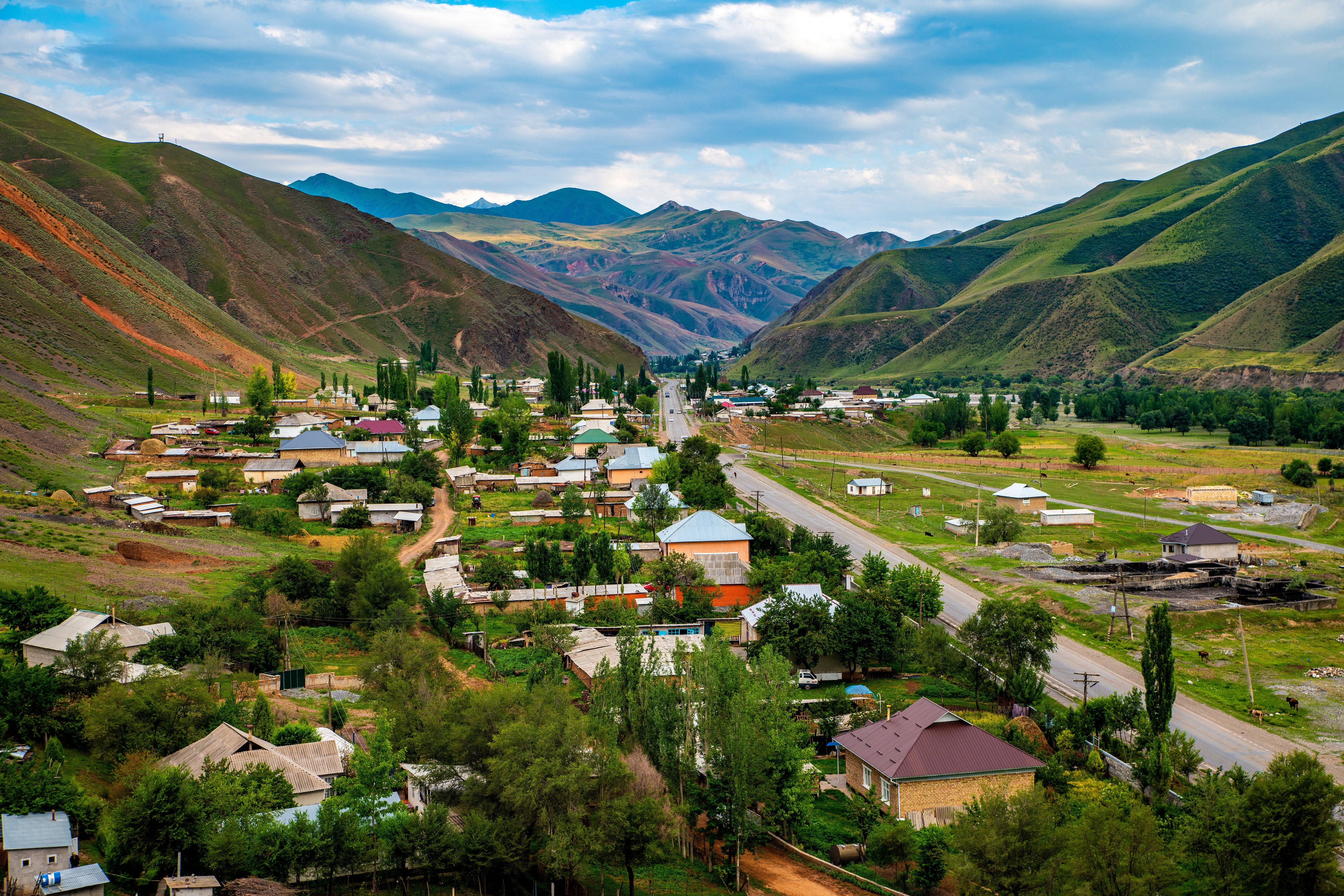 Village in Osh Region, Kyrgyzstan with Mountains and Roads HD Wallpaper