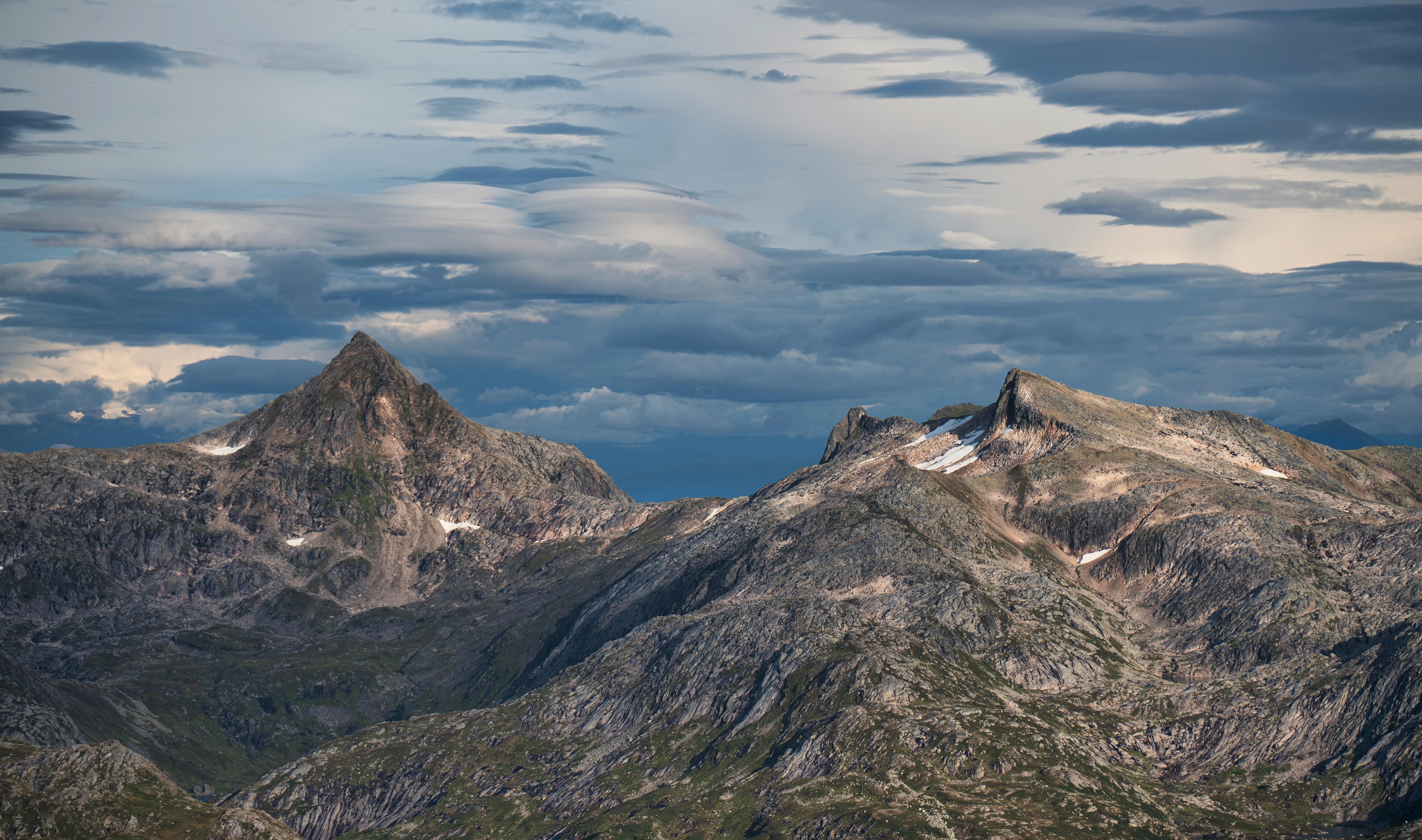 Bukketinden Mountains in Norway under Clouds HD Wallpaper