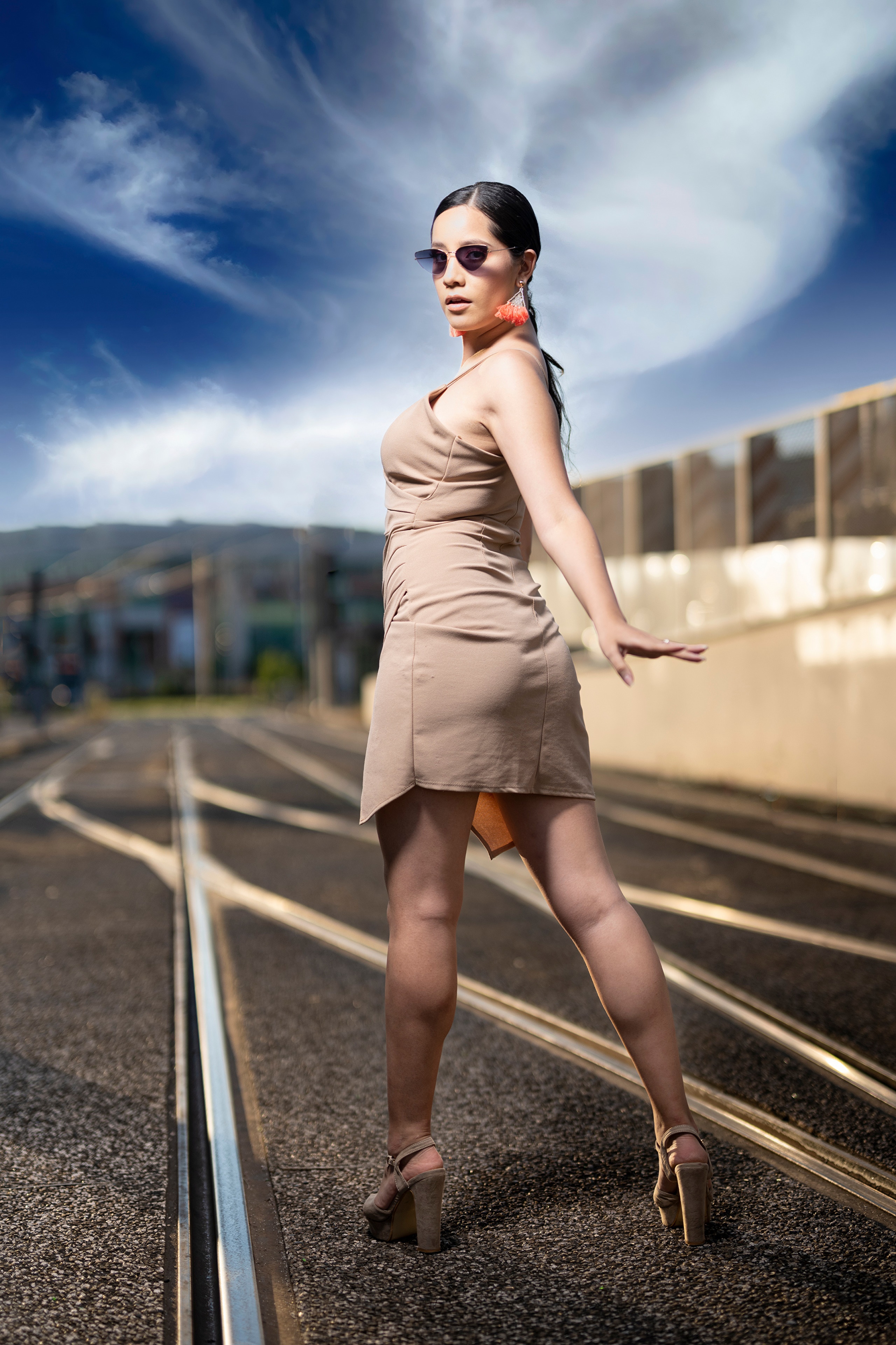 Brunette girl in dress and glasses posing HD Phone Wallpaper