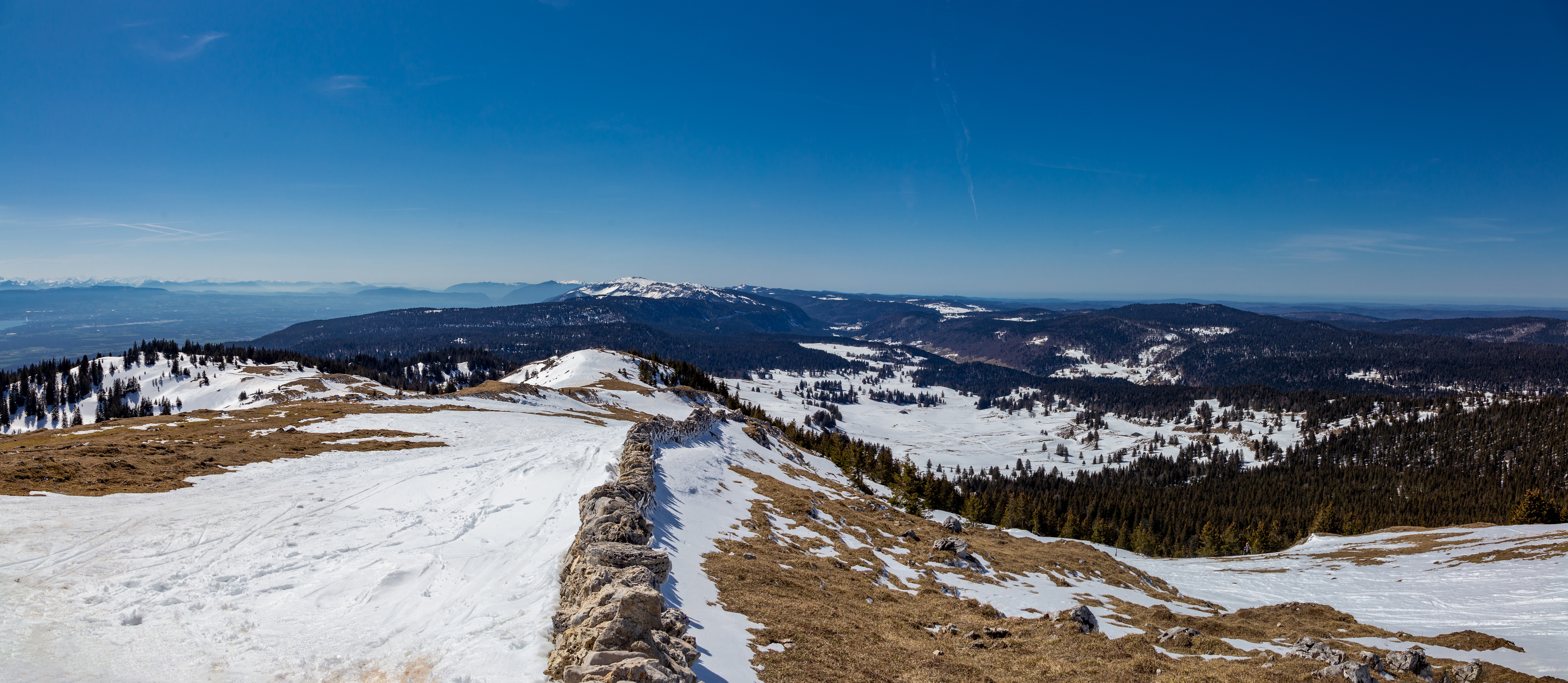 Panoramic view of snow-covered mountains in Switzerland HD Wallpaper