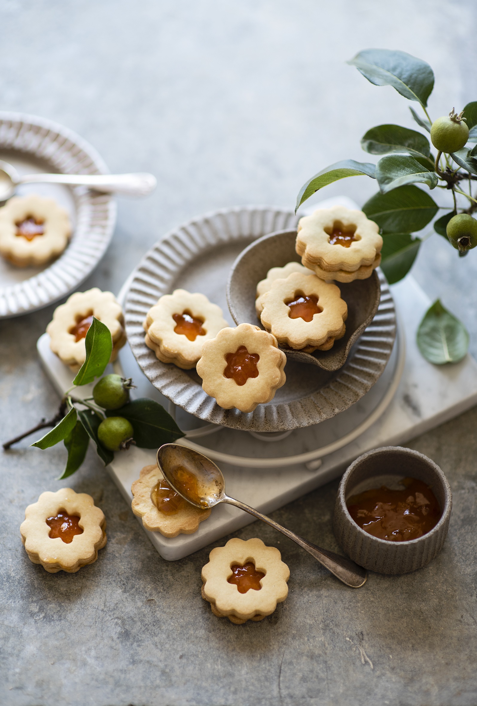 Linzer cookies with jam on plates and a spoon HD Phone Wallpaper