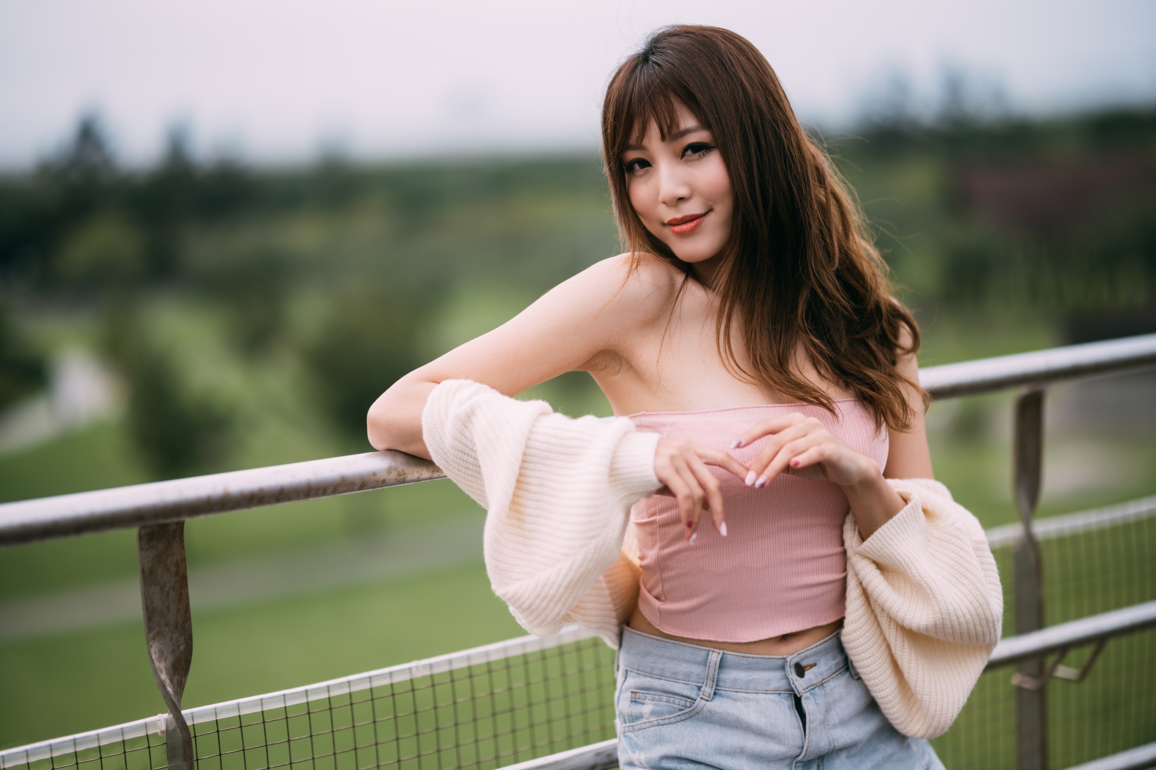 Asian woman in pink tube top and jeans HD Wallpaper