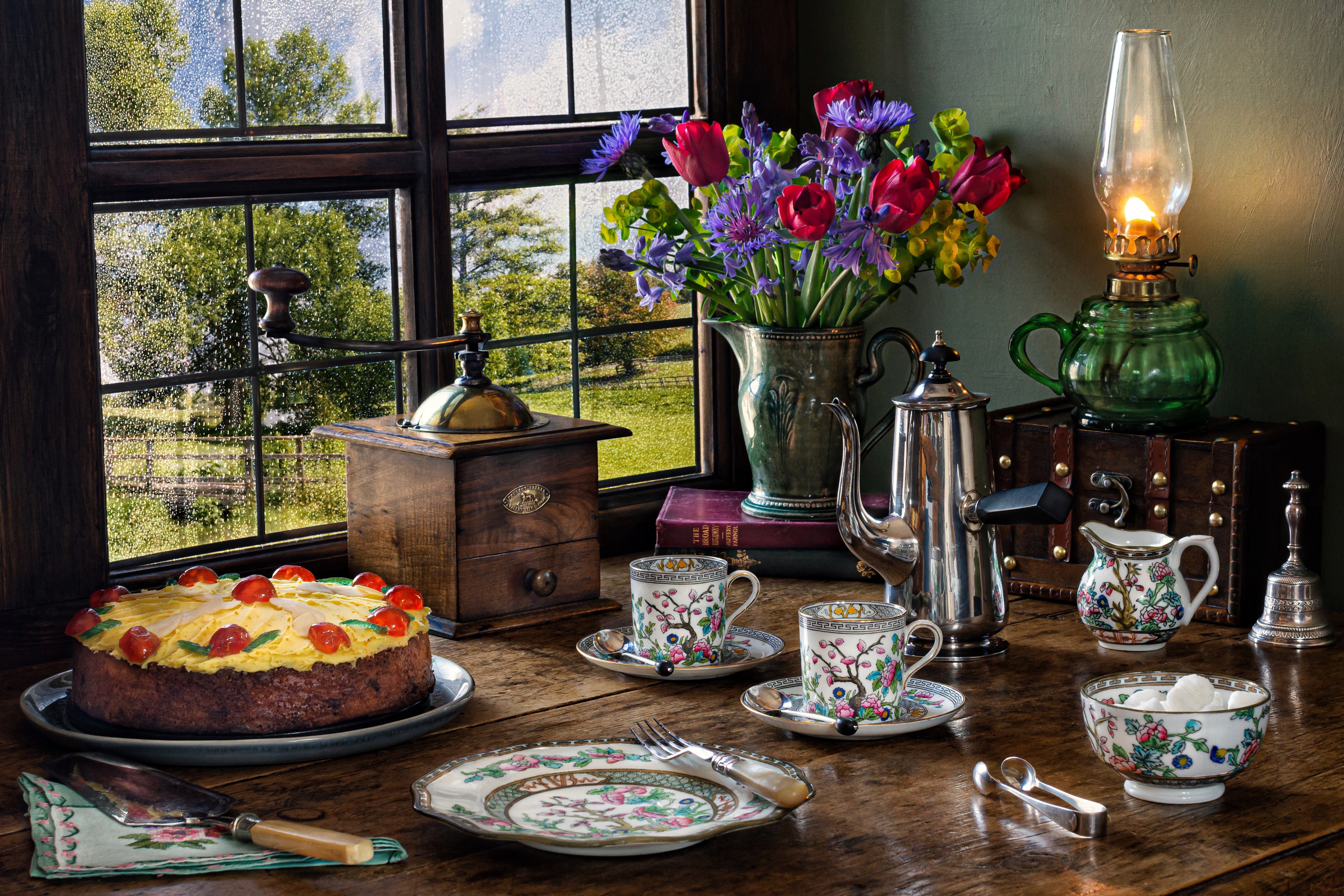 Still-life with cake, coffee set, and flowers by the window HD Wallpaper