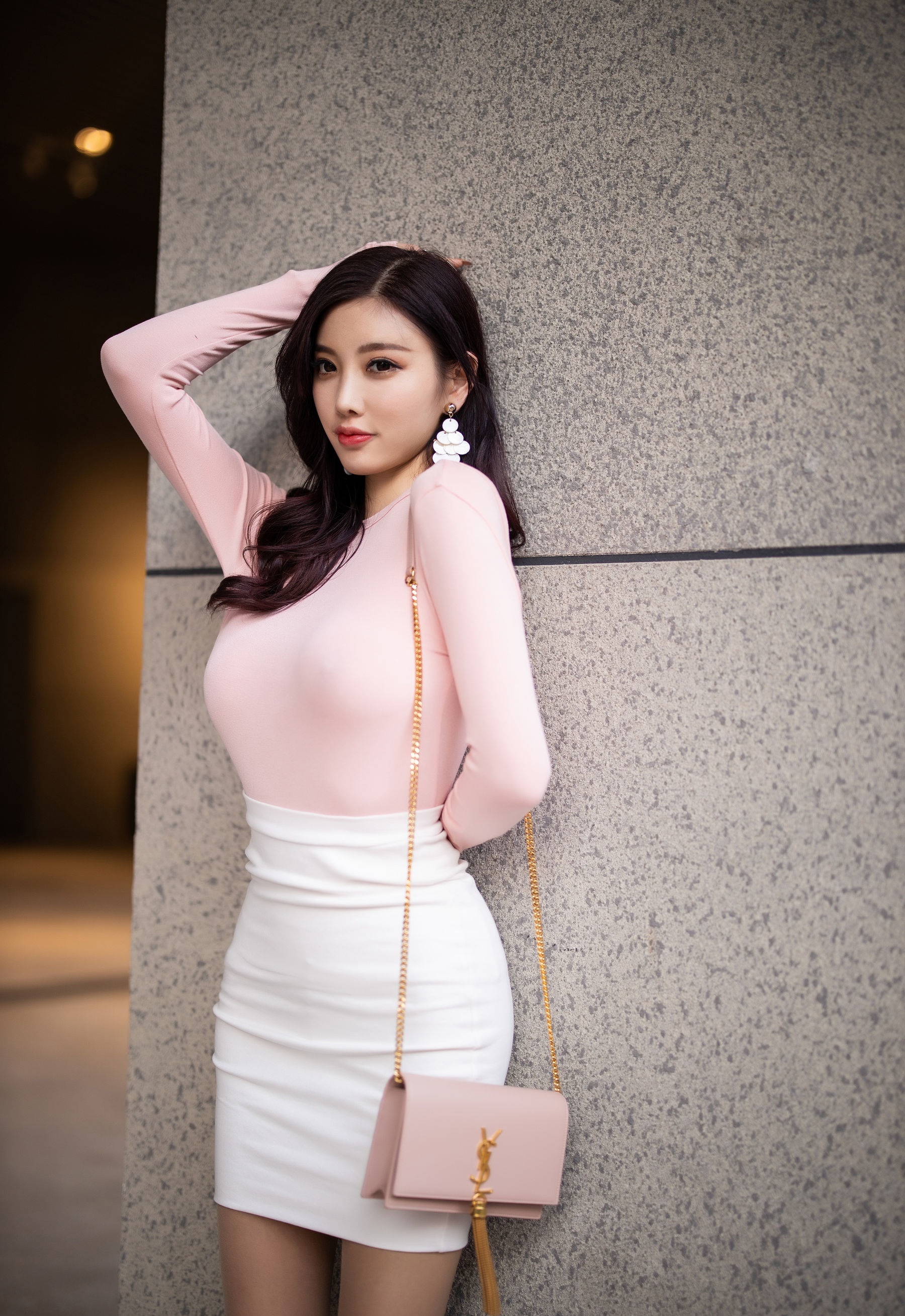 Asian woman in pink top and white skirt with handbag HD Phone Wallpaper