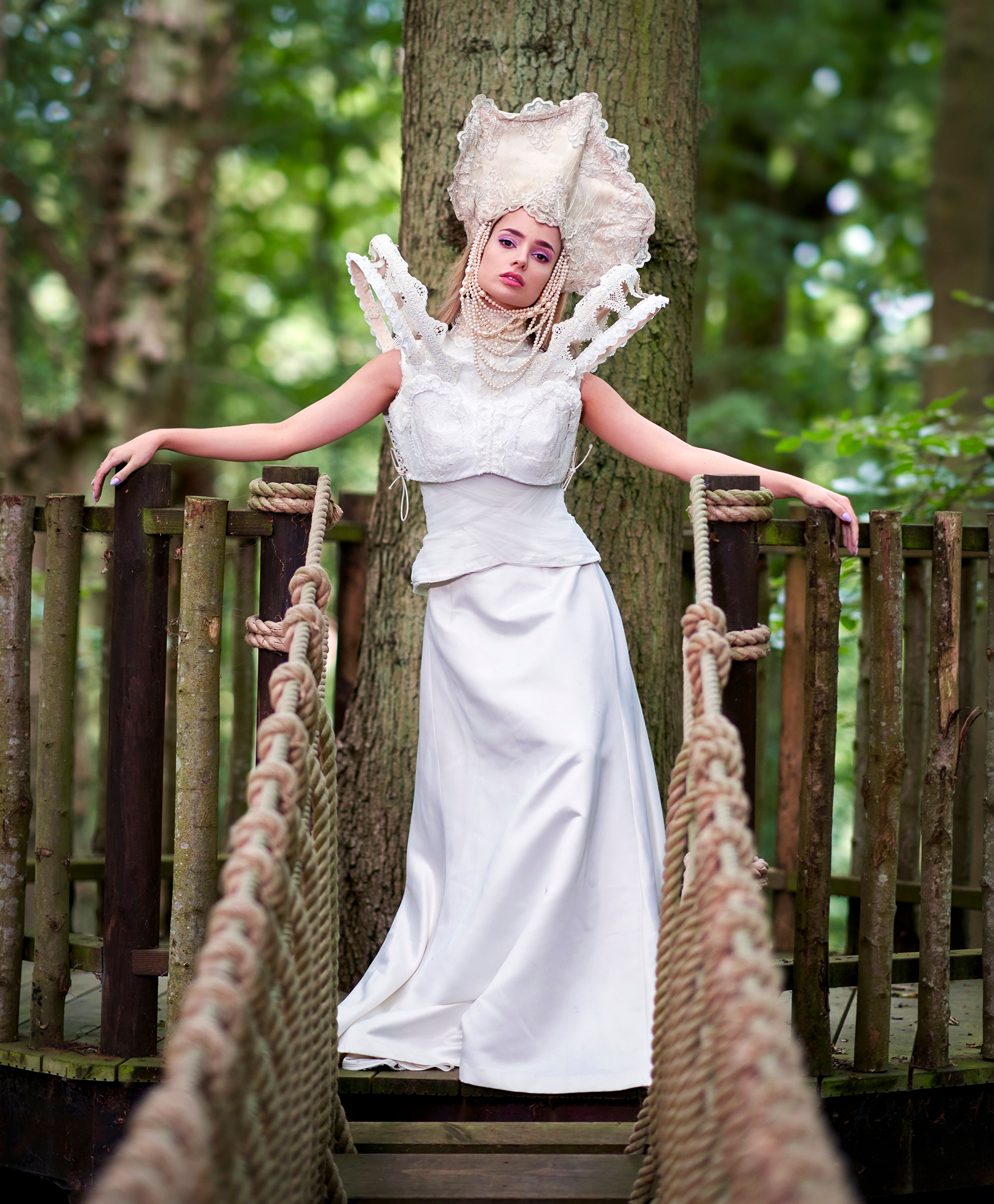 Woman in white dress and headdress on a wooden bridge HD Phone Wallpaper