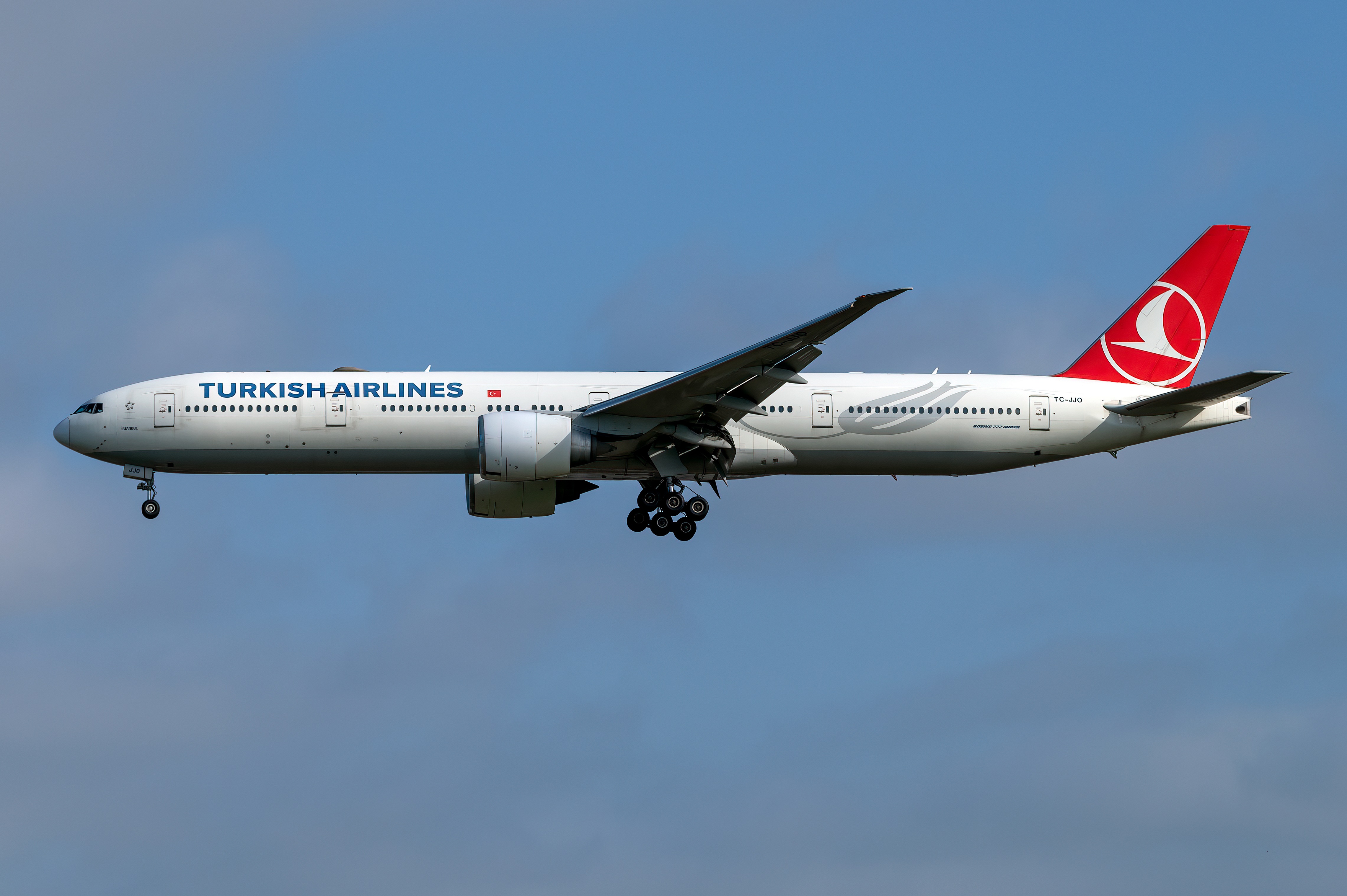 Turkish Airlines Boeing 777-300ER airplane in flight HD Wallpaper