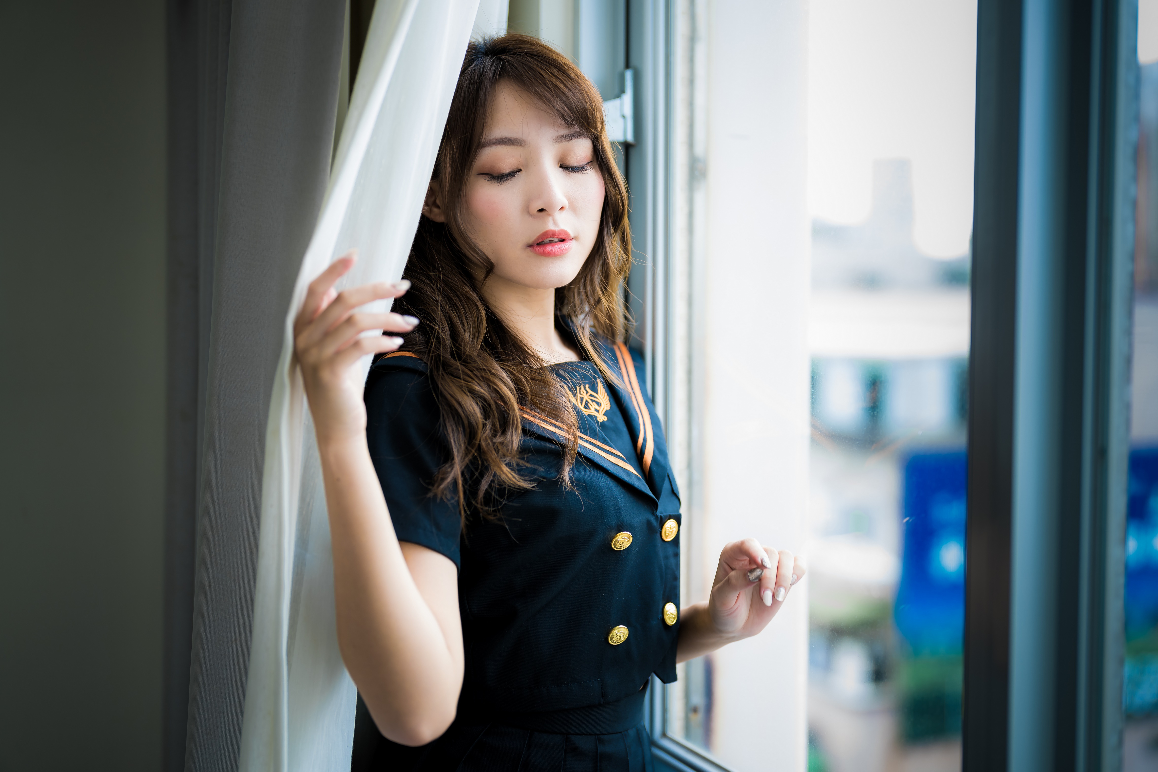 Asian woman in sailor uniform by the window HD Wallpaper