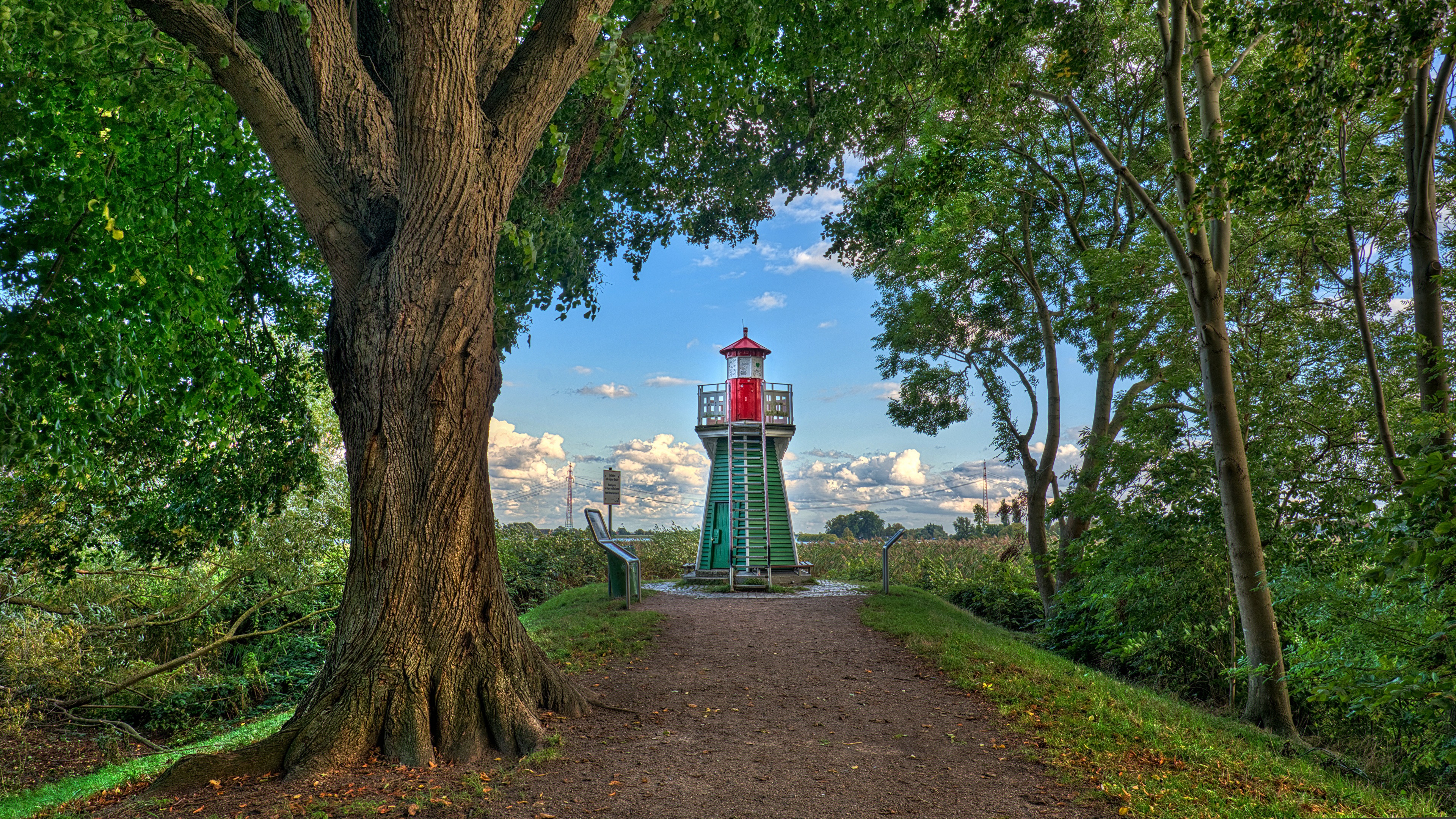 Bunthaus lighthouse in Germany with trees HD Wallpaper